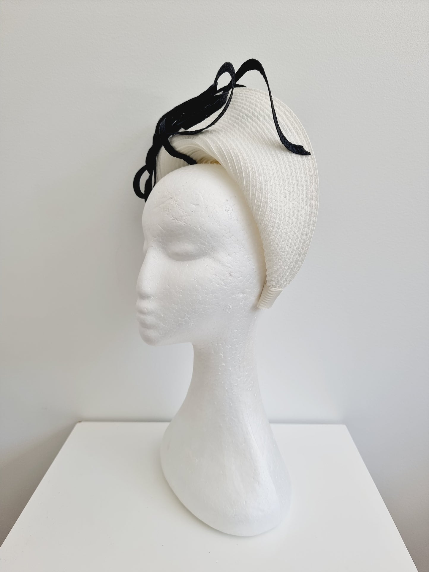 Miss Hannah. Womens off white halo headband with black detail Fascinator