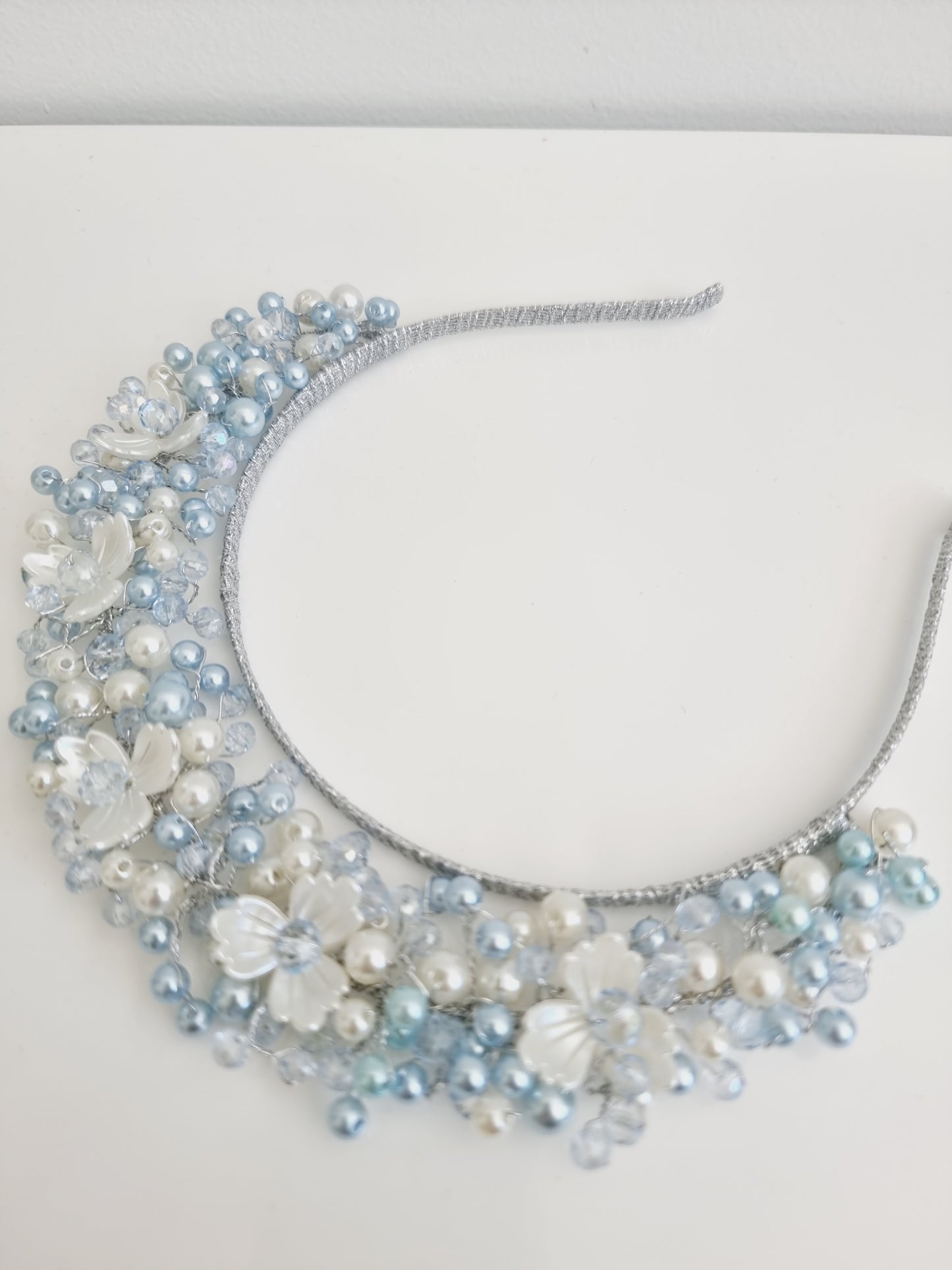 Miss Sienna. Womens pearl and crystal beaded headband fascinator in Pale Blue / white