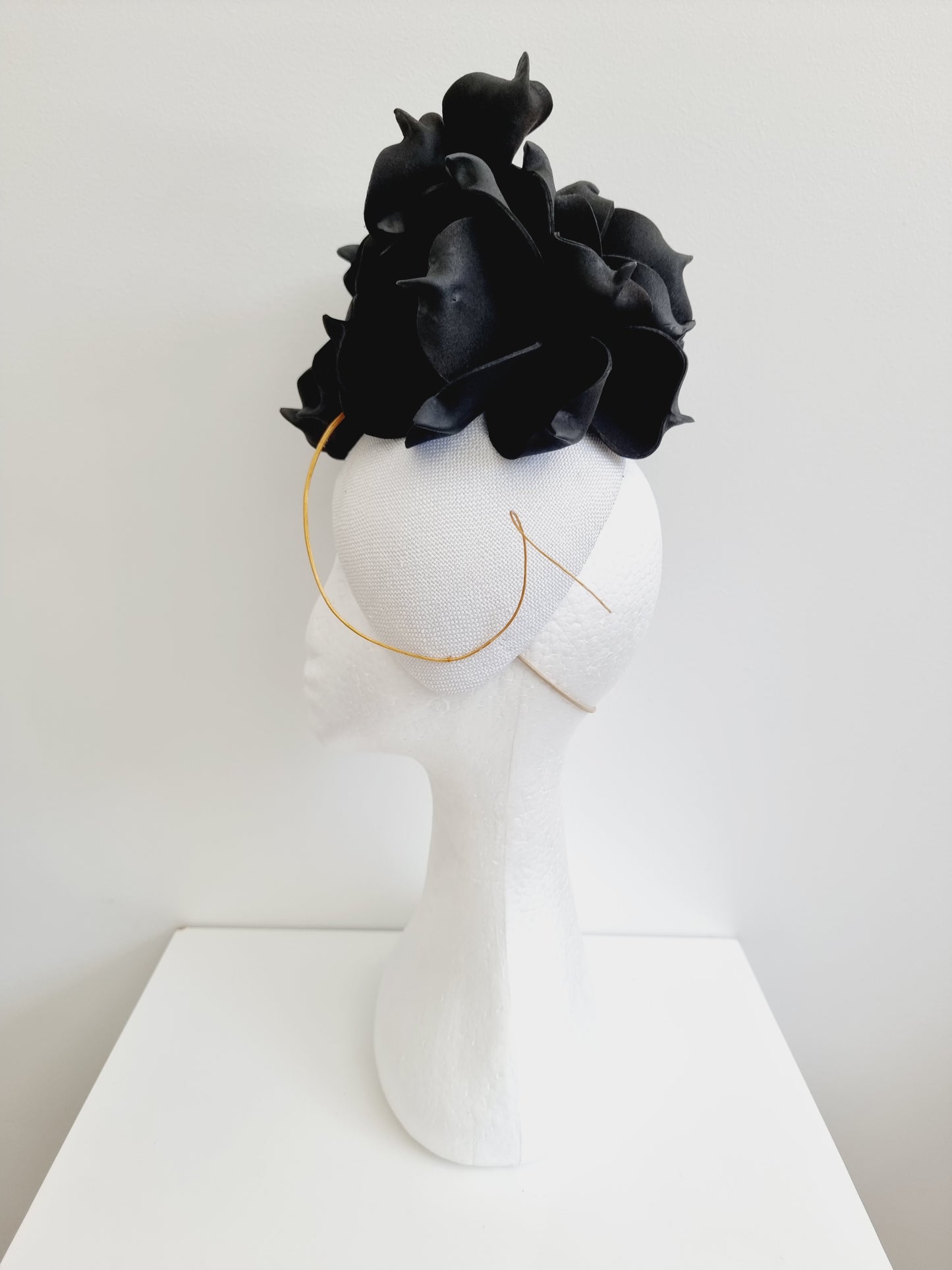 Miss June. Womens black and white fascinator with gold