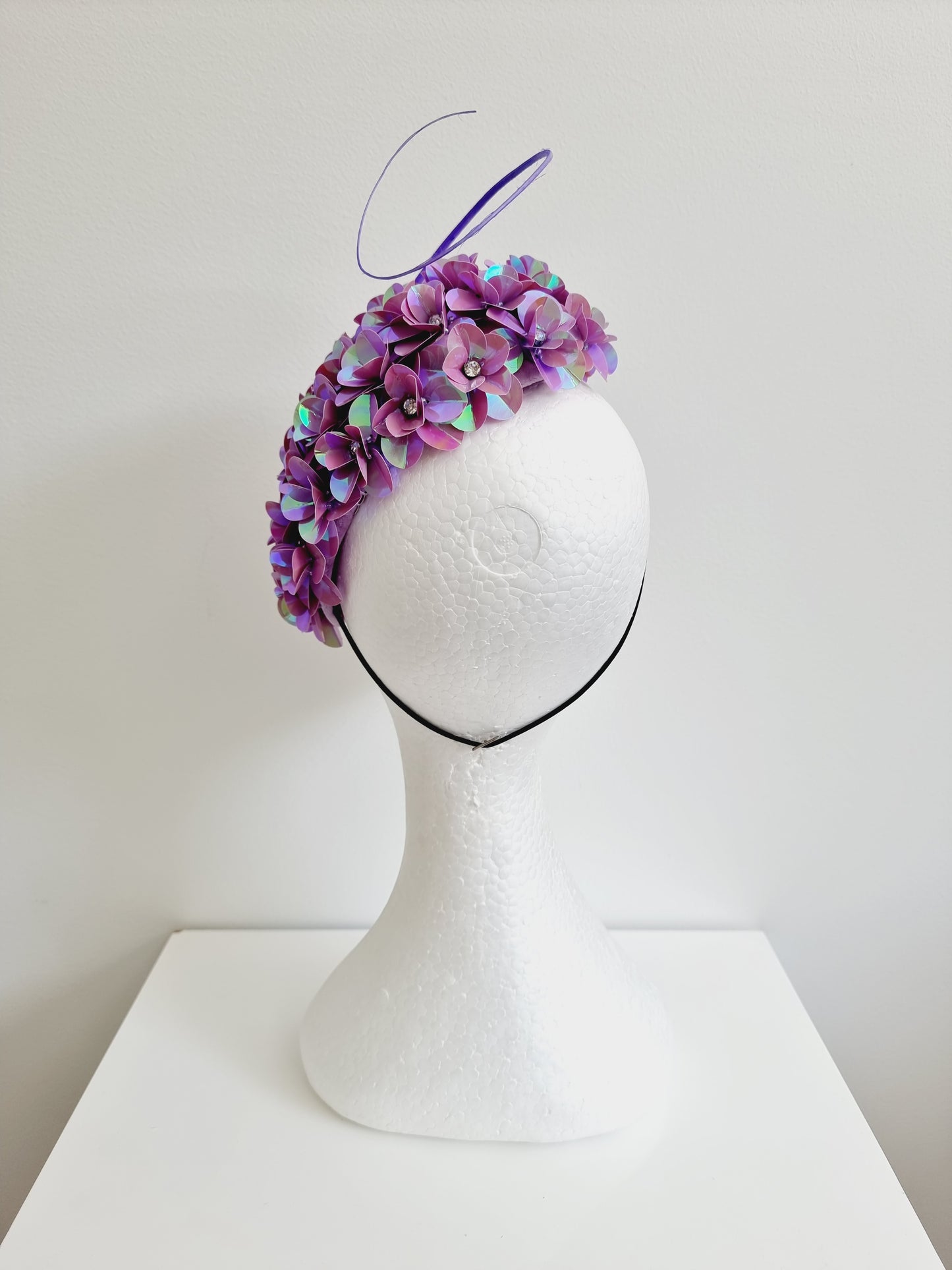 Miss Jamie . Womens mauve 3D flower encrusted fascinator with quill