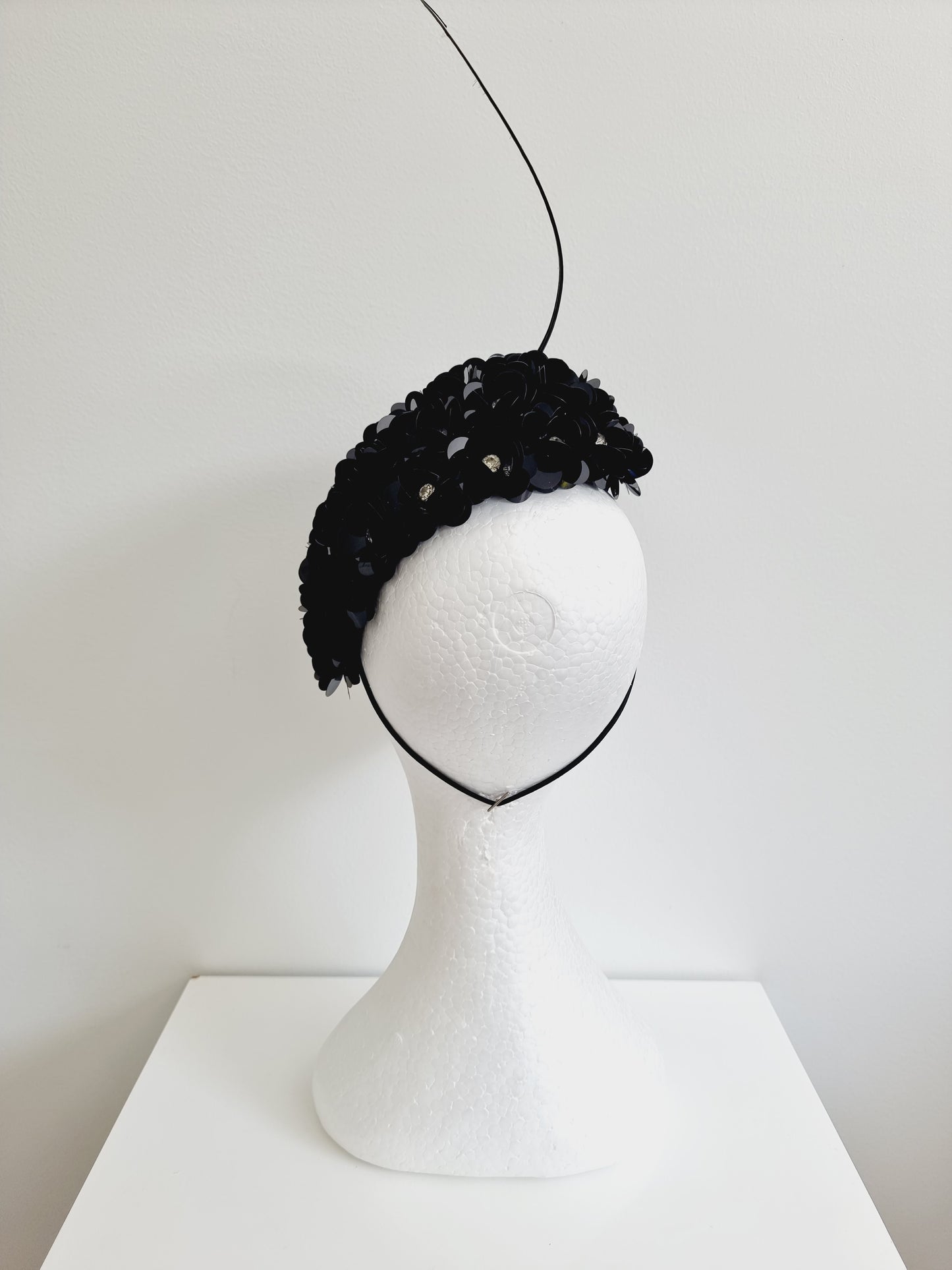 Miss Jamie . Womens Black 3D flower encrusted fascinator with quill