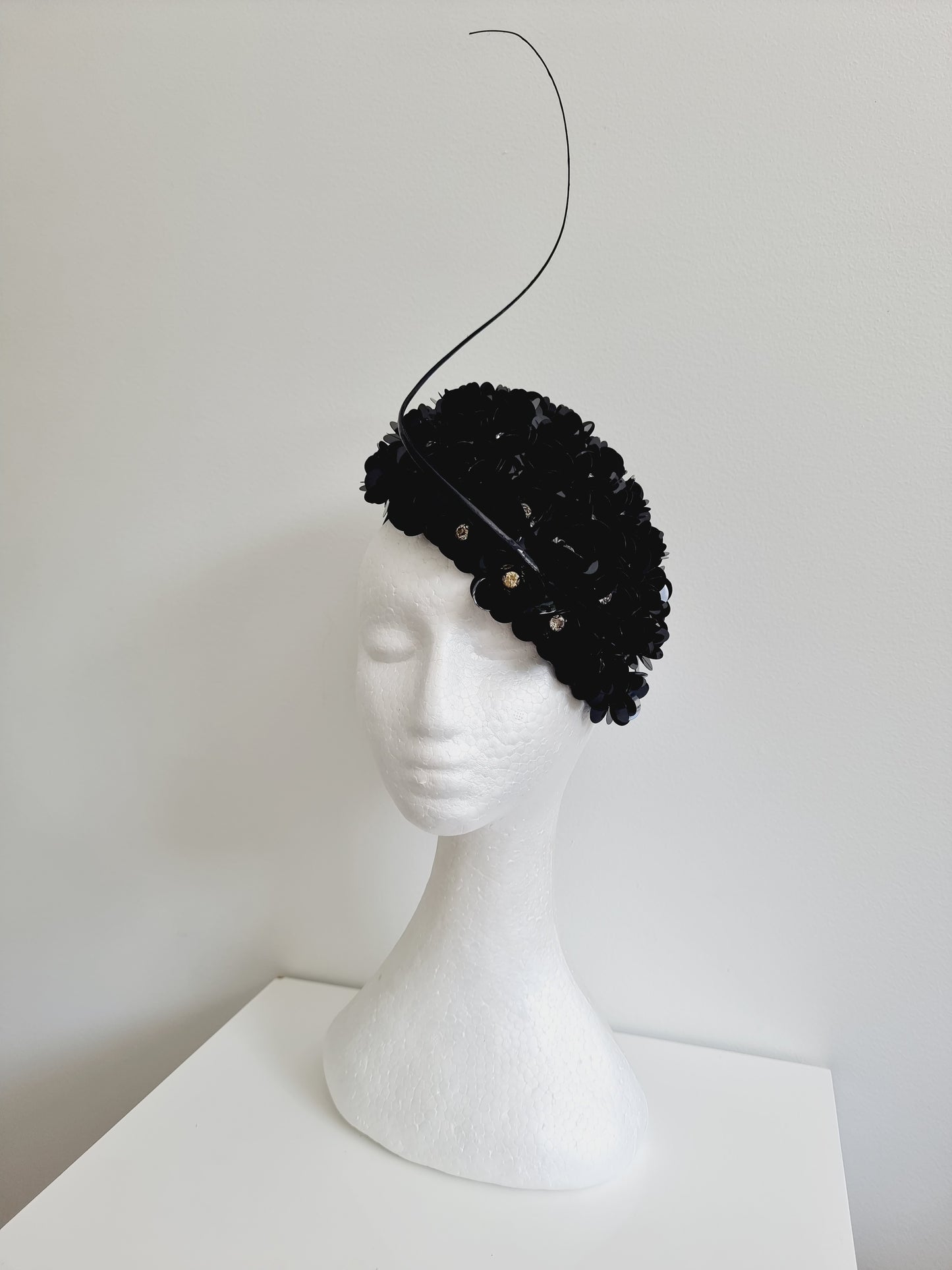Miss Jamie . Womens Black 3D flower encrusted fascinator with quill