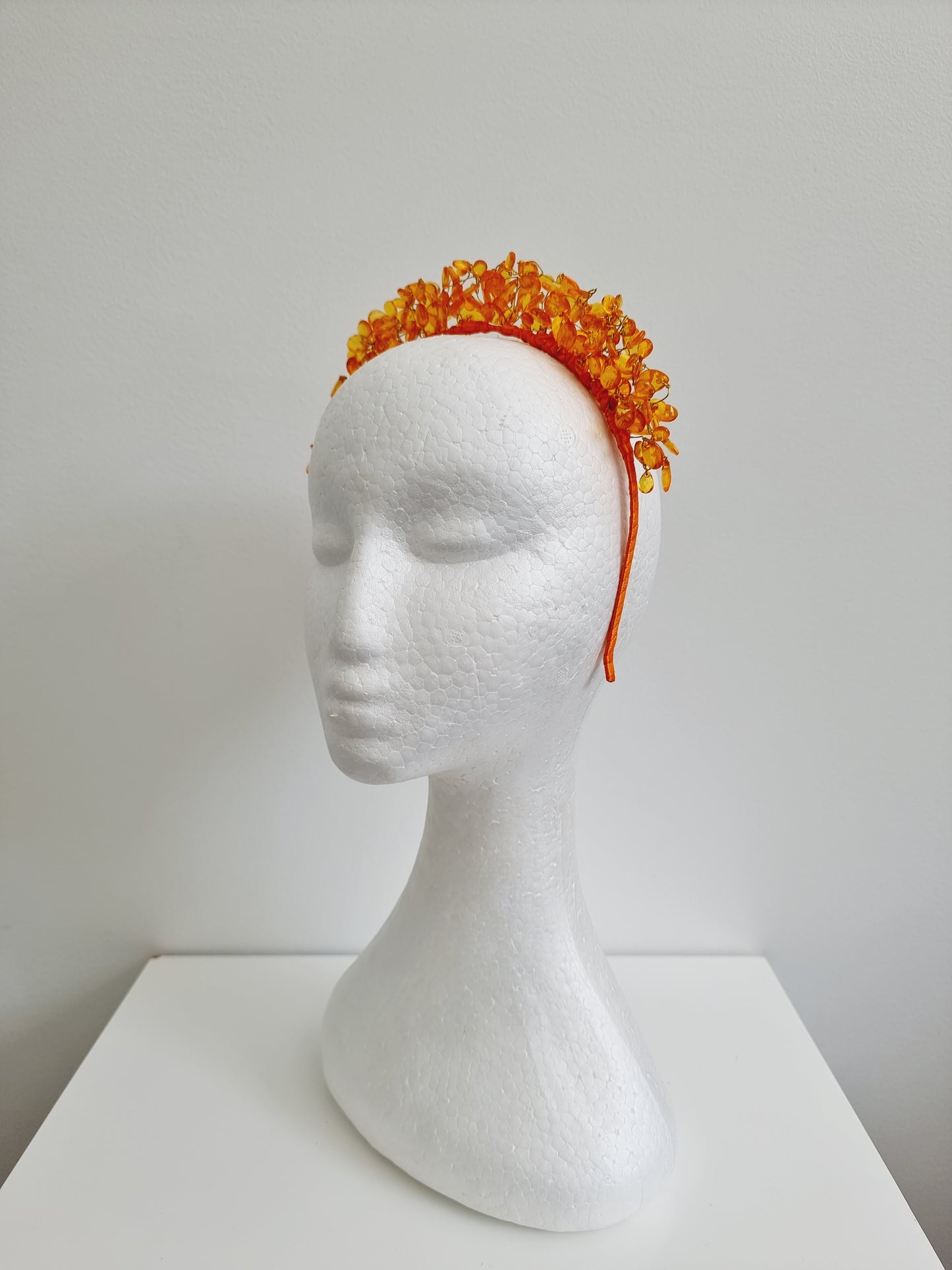 Miss Haraa. Womens  droplet headband in Orange