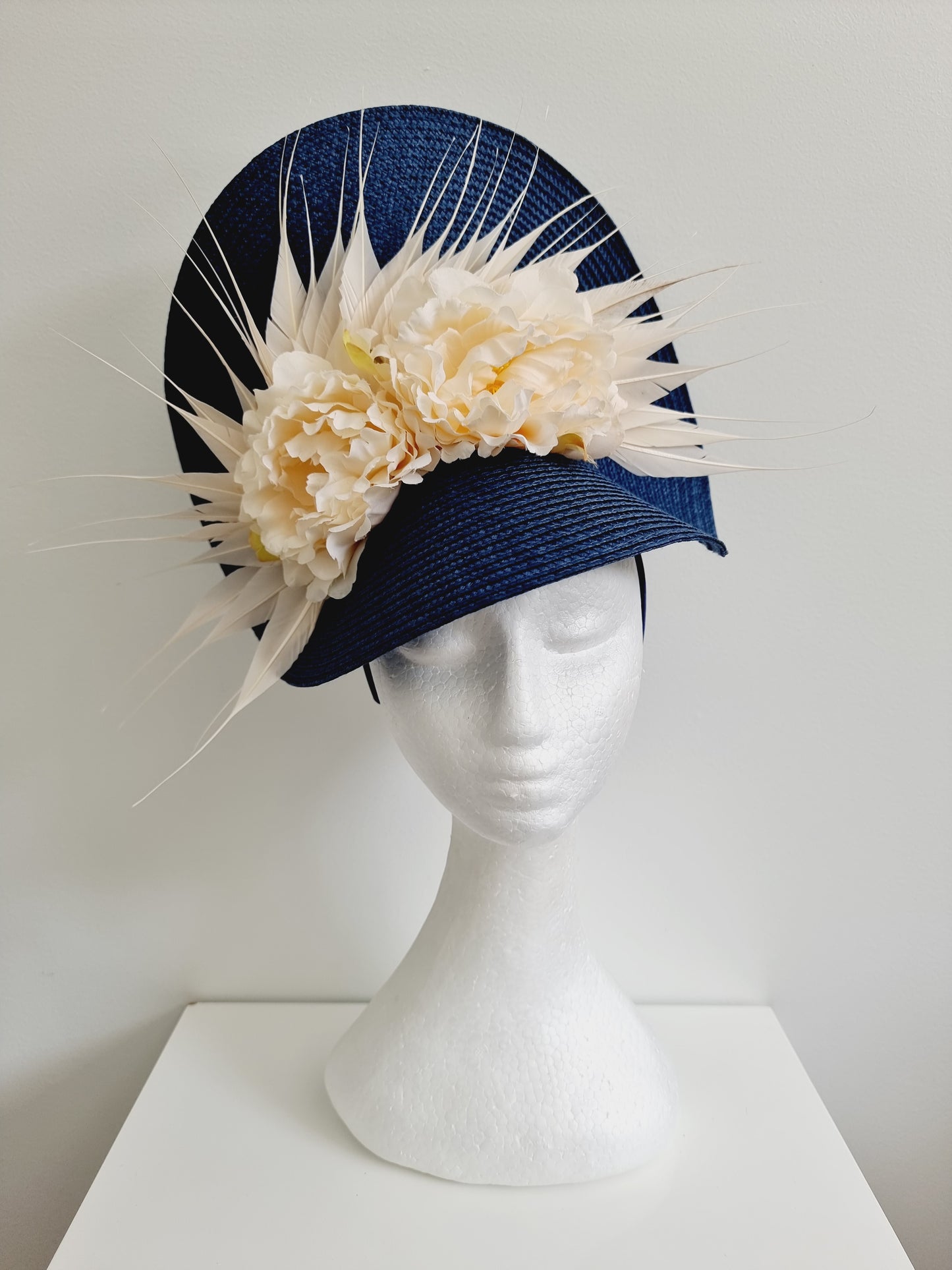 Miss Striking. Womens navy blue and cream headband fascinator
