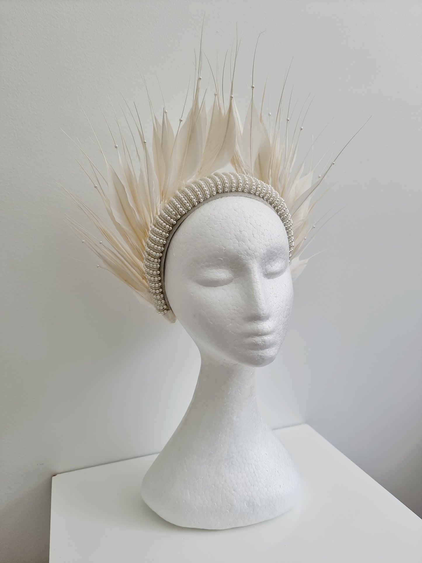 Miss Aldia. Womens ivory pearl and feather headband fasinator