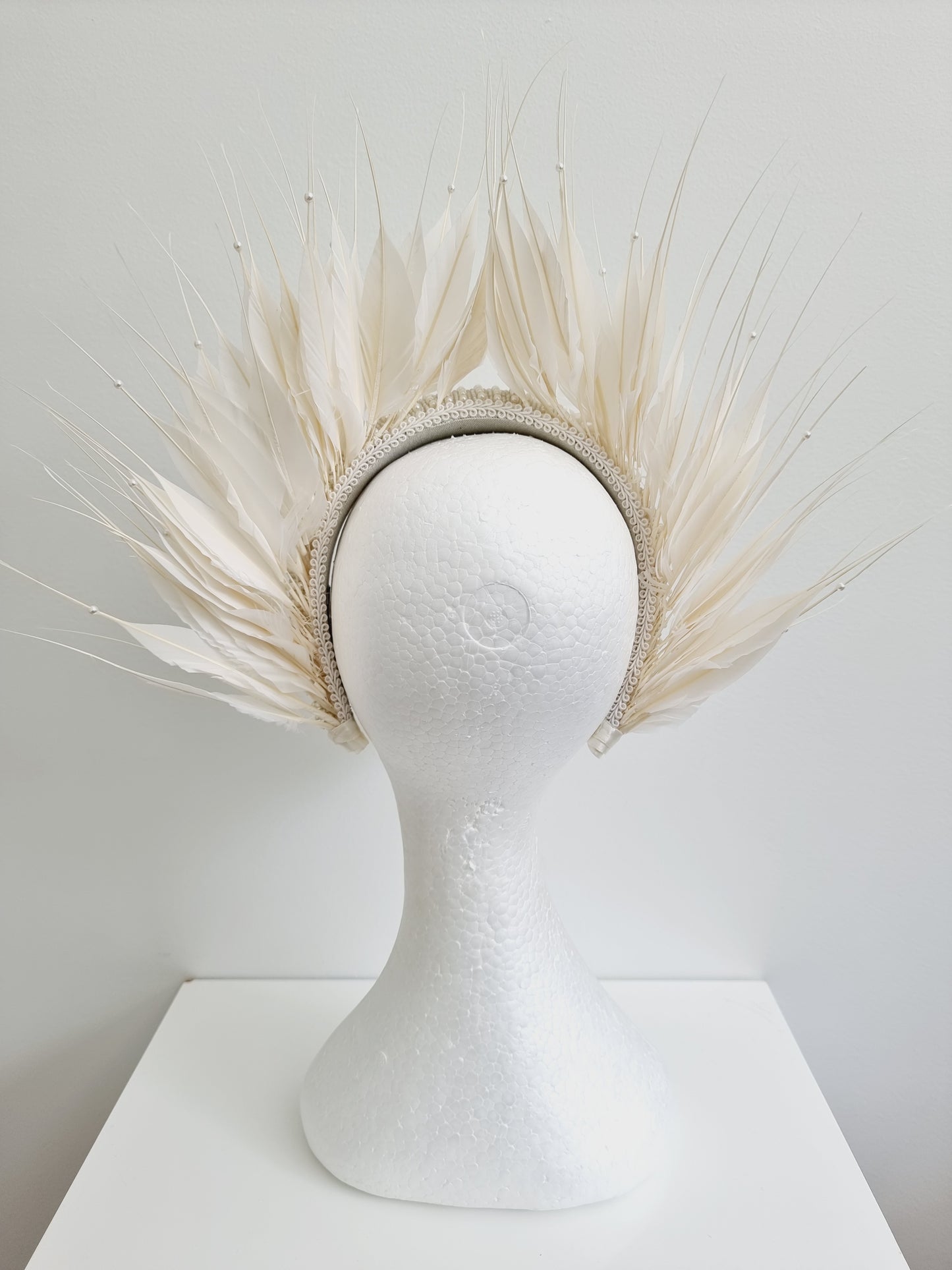 Miss Aldia. Womens ivory pearl and feather headband fasinator