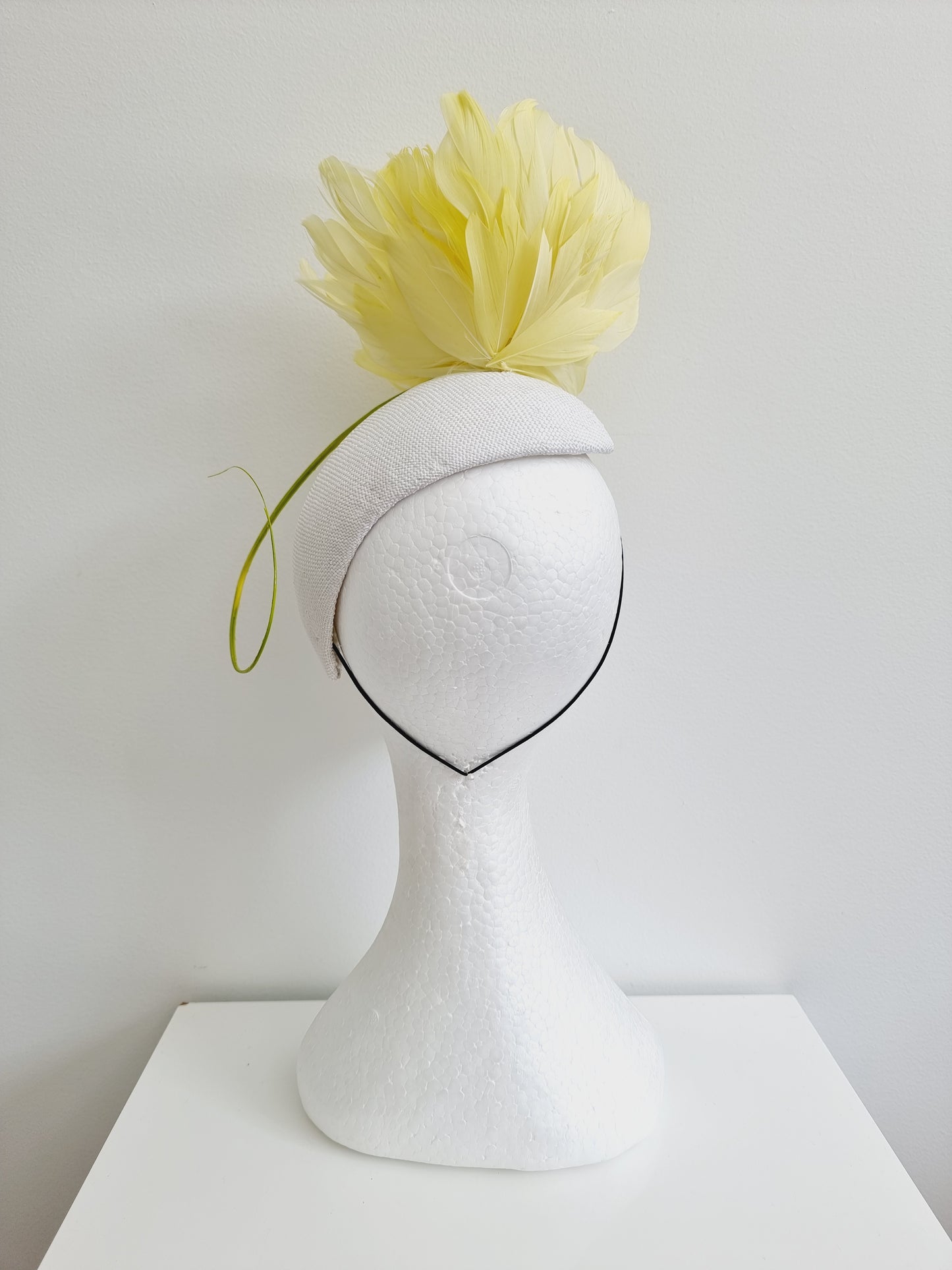 Miss Lallie. Womens white straw face hugger fascinator with lemon flower