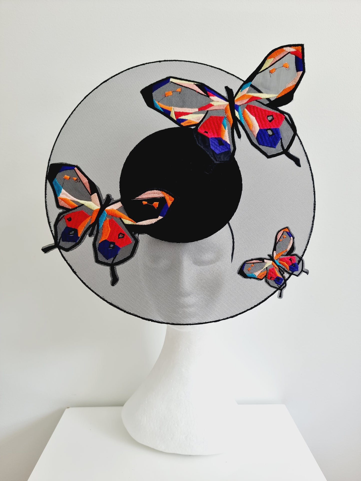 Miss Calista. Womens black satellite percher headband fascinator with butterflies