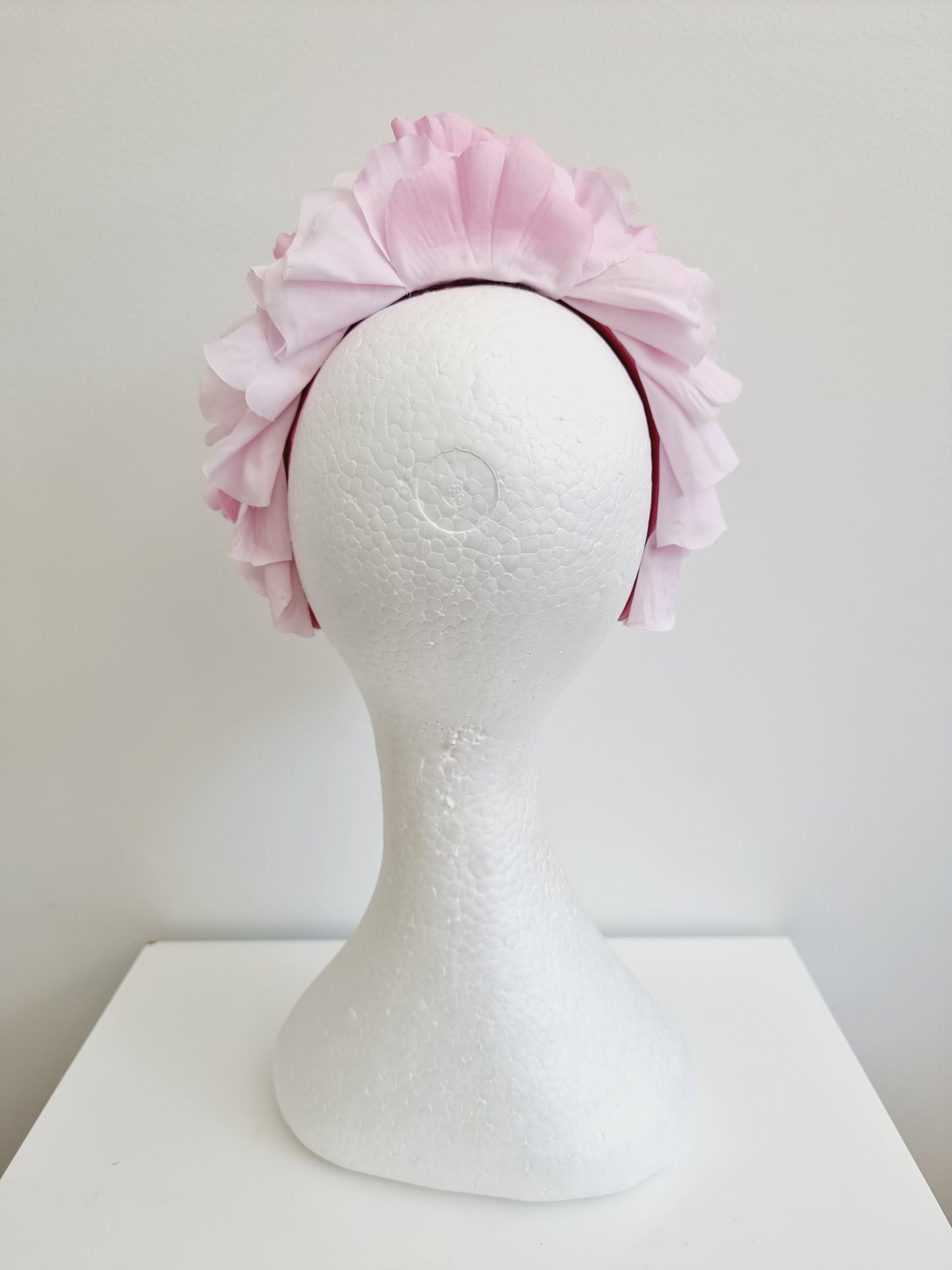 Miss Trixie. Womens ruffle embellished headband with veiling in Pale Pink