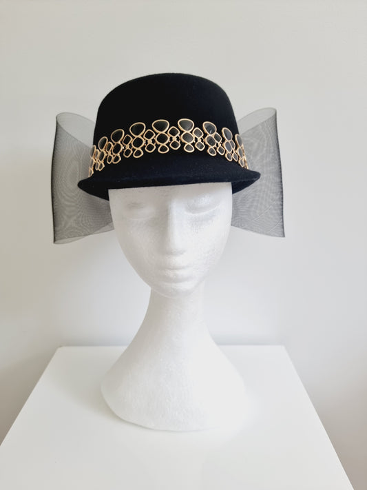 Miss Bianca. Womens Black wool felt cap with gold detailing and bow