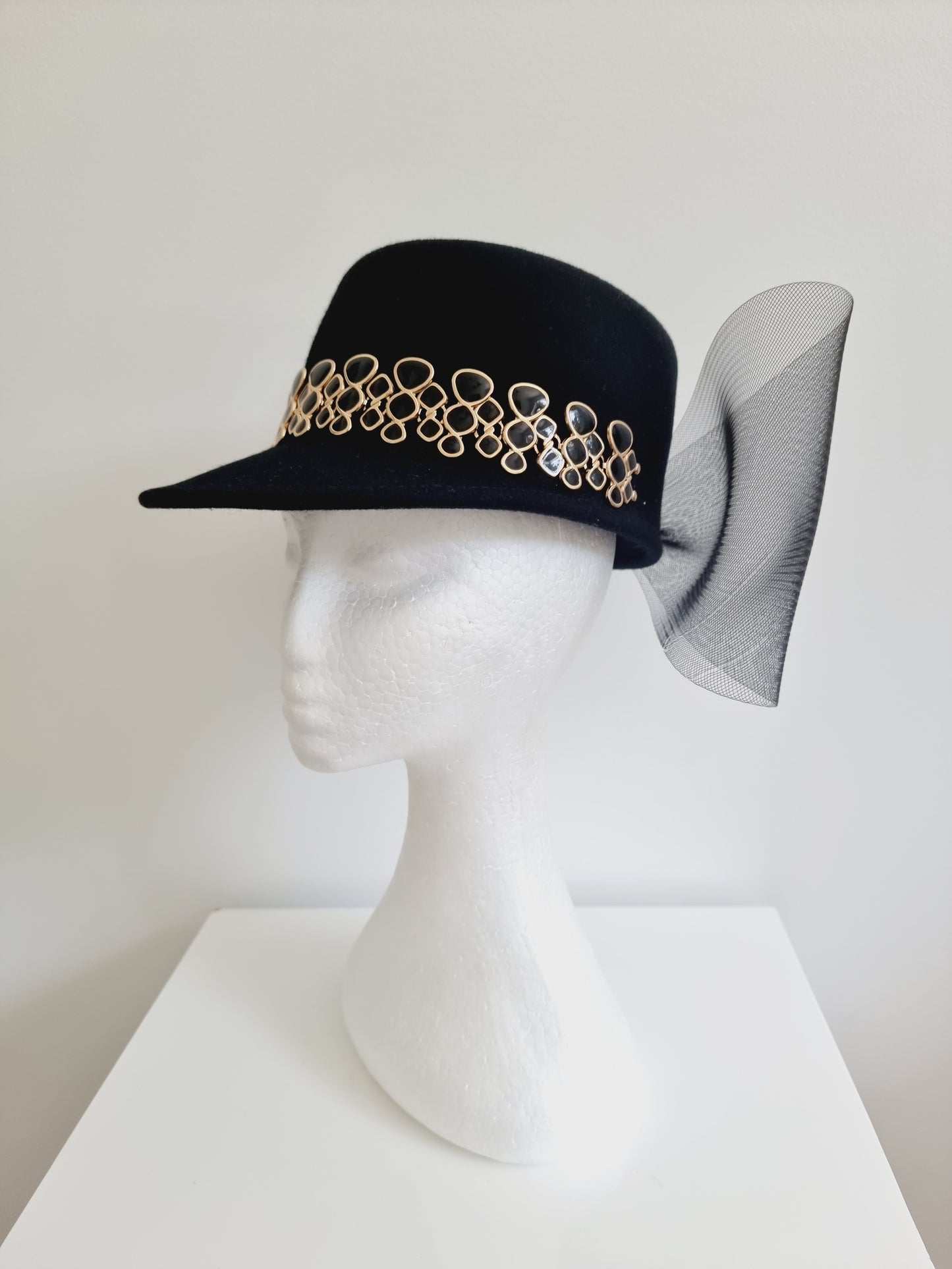 Miss Bianca. Womens Black wool felt cap with gold detailing and bow