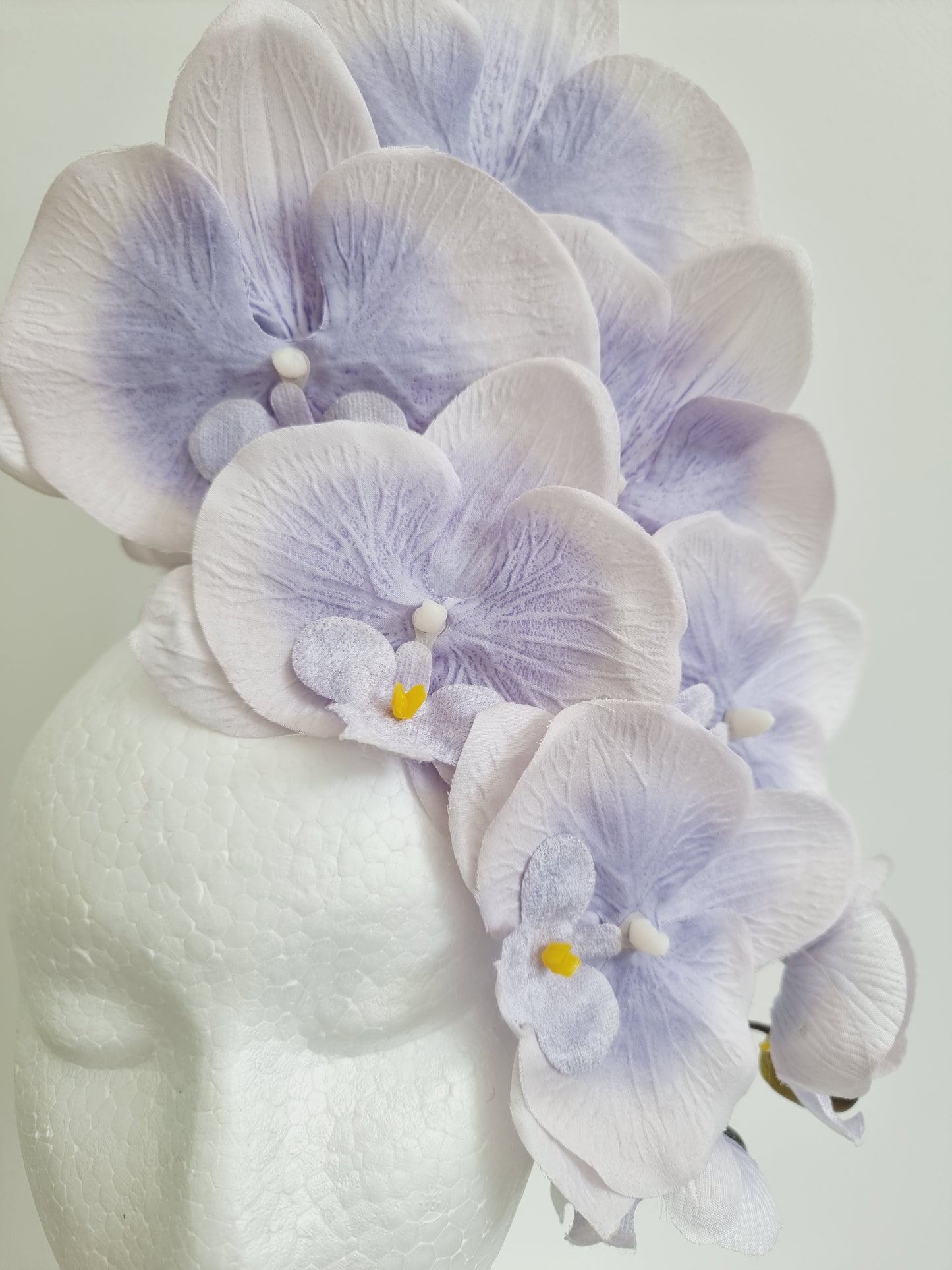Miss Alexia womens faux orchid flower headband fascinator in tonal Lavender