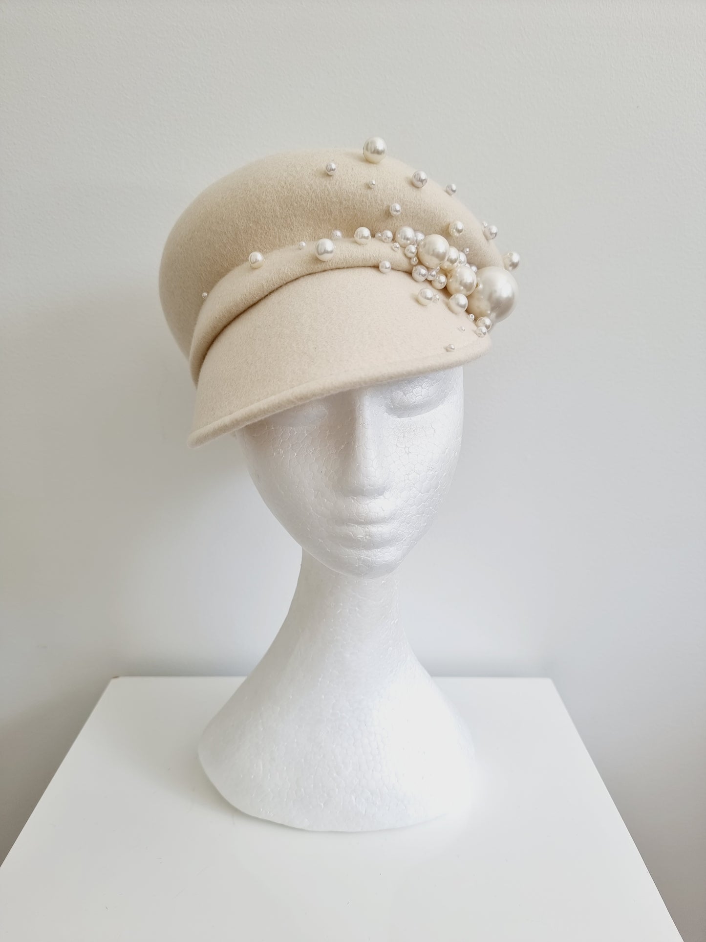 Miss Jamesion. Womens Ivory wool felt cap with pearl detailing