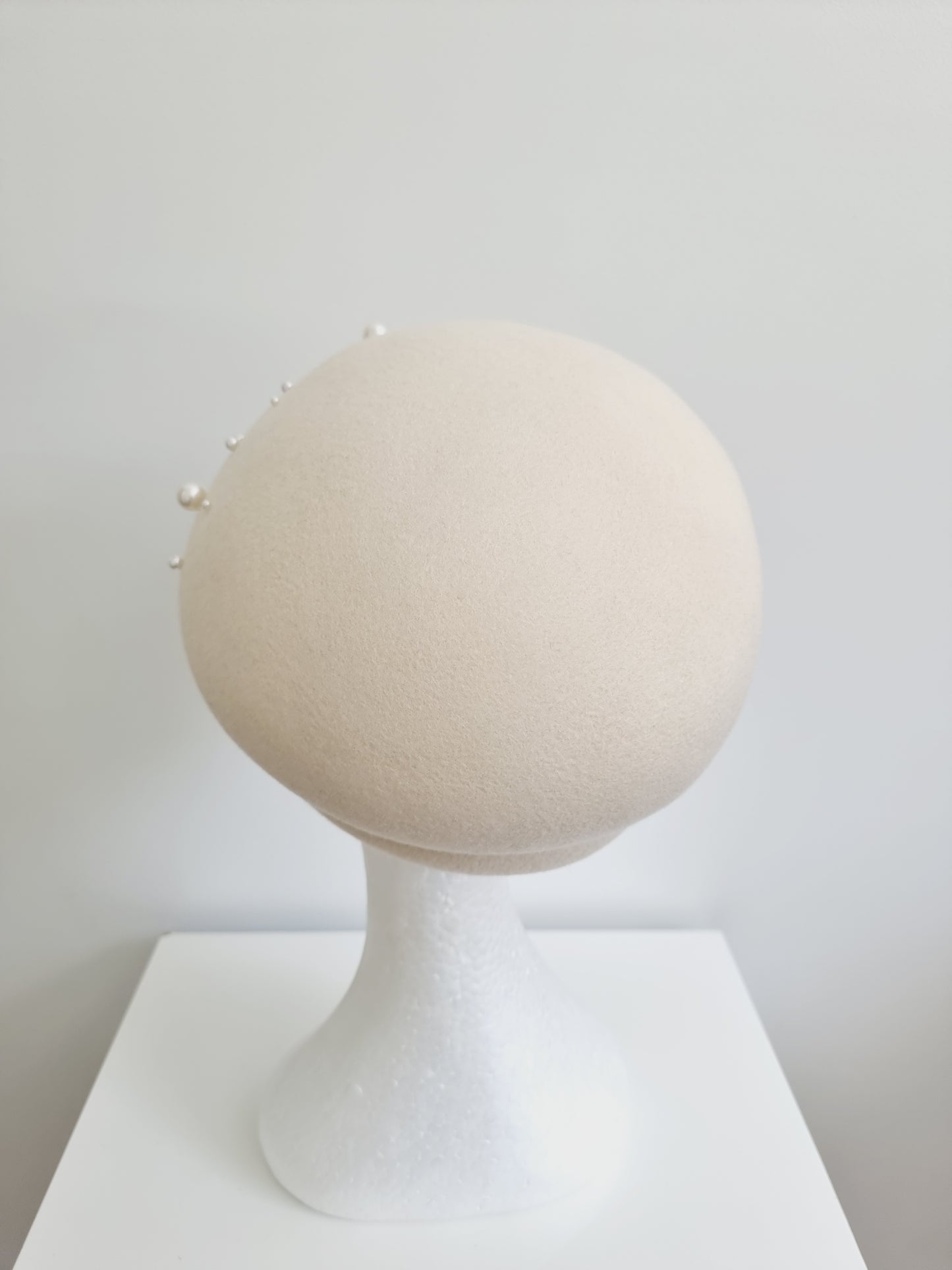 Miss Jamesion. Womens Ivory wool felt cap with pearl detailing