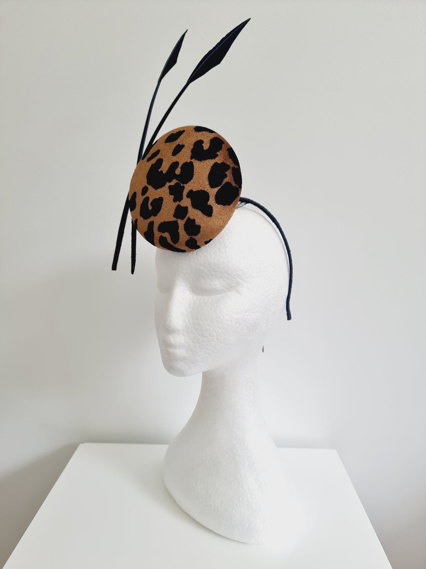 Miss Animal Instinct. Womens animal print percher headband fascinator