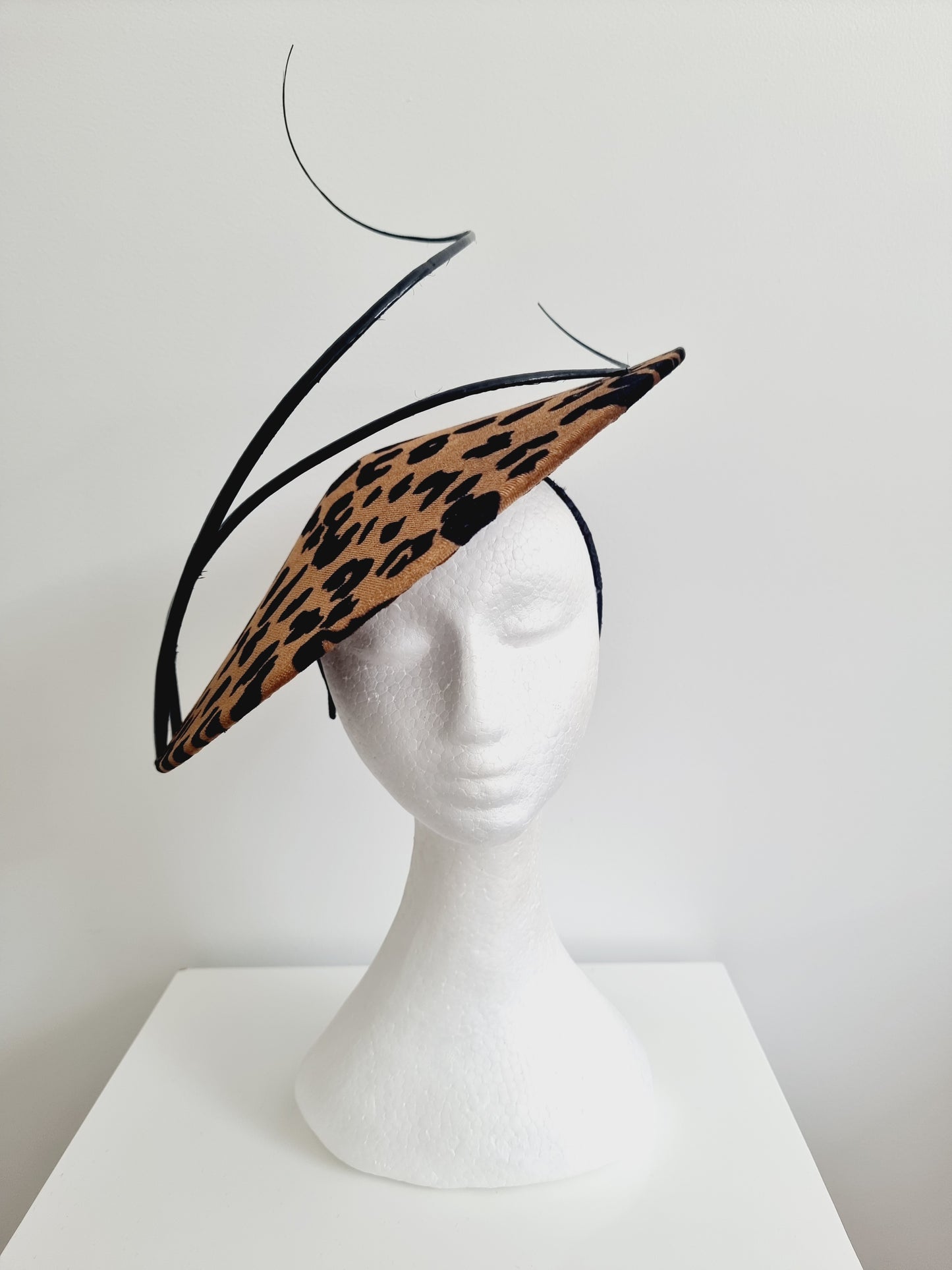 Miss Call of the wild. Womens low coolie animal print fascinator