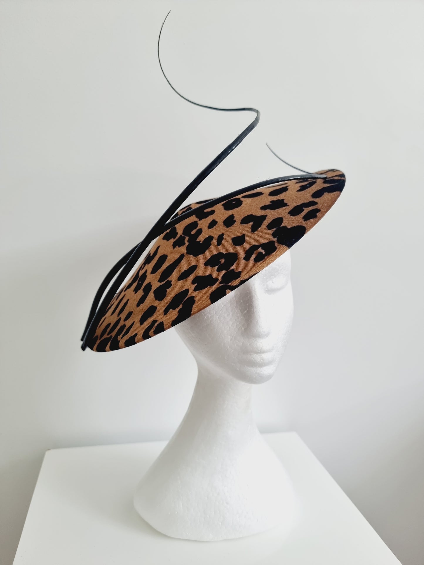 Miss Call of the wild. Womens low coolie animal print fascinator