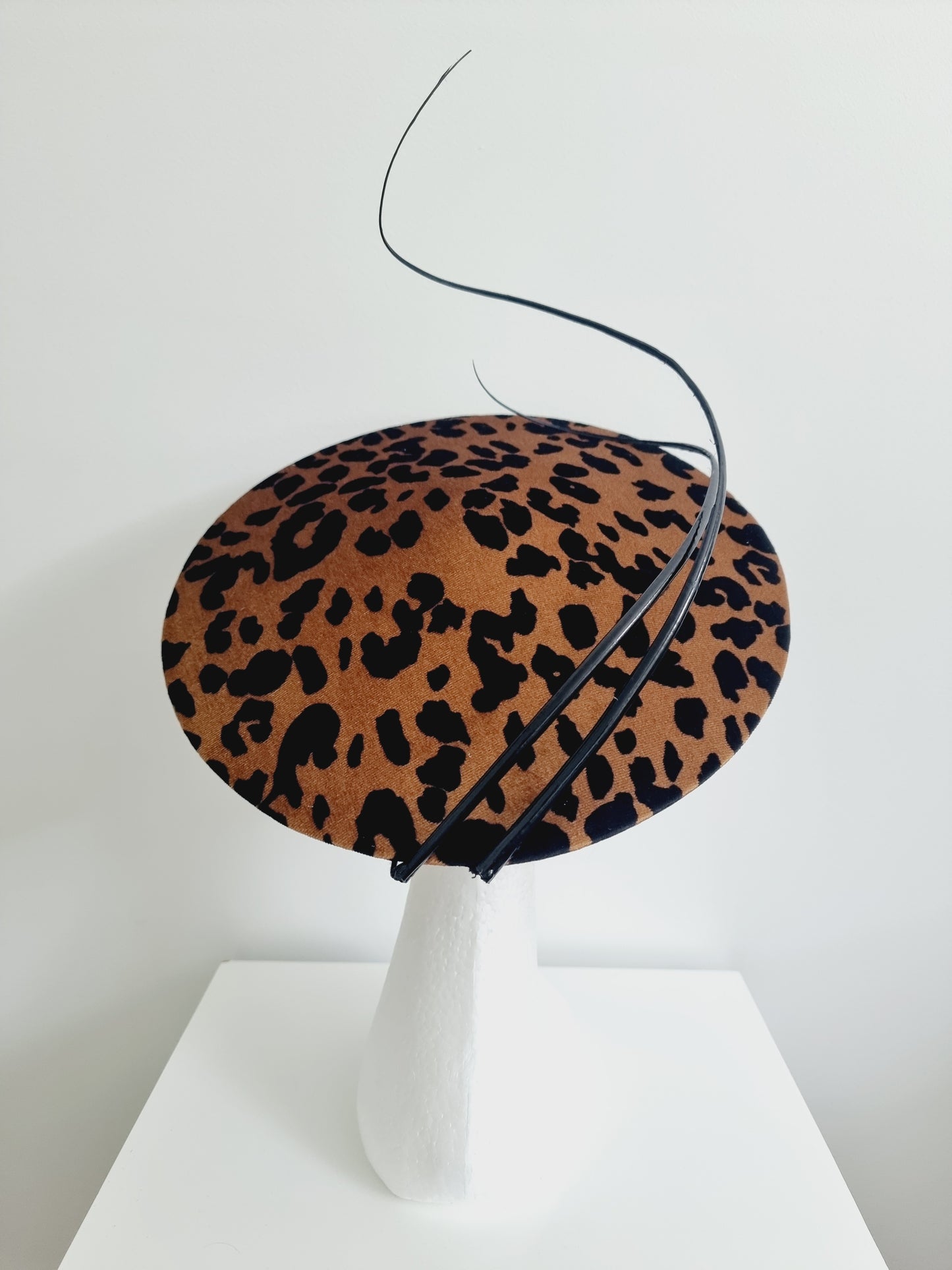 Miss Call of the wild. Womens low coolie animal print fascinator