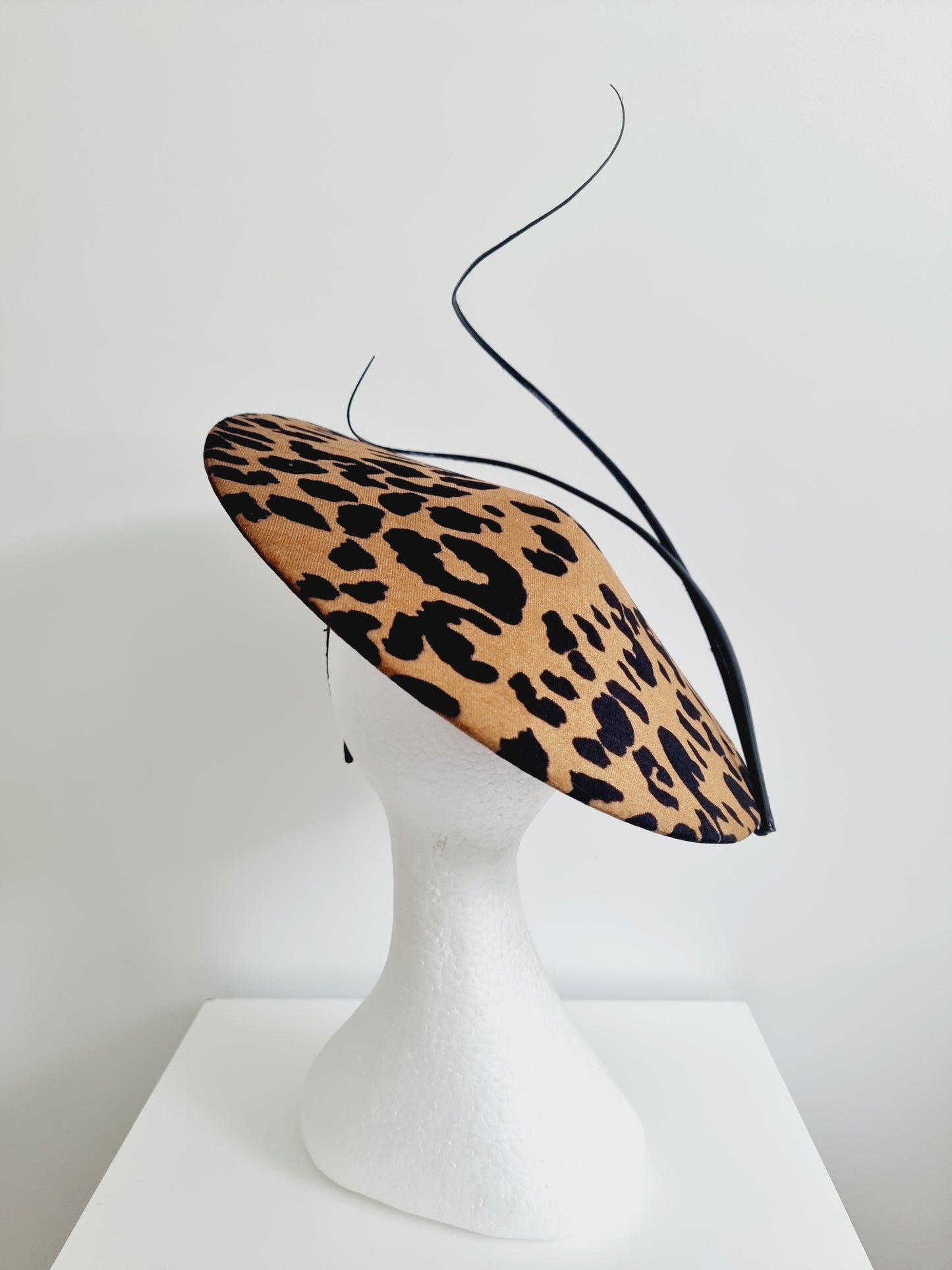 Miss Call of the wild. Womens low coolie animal print fascinator