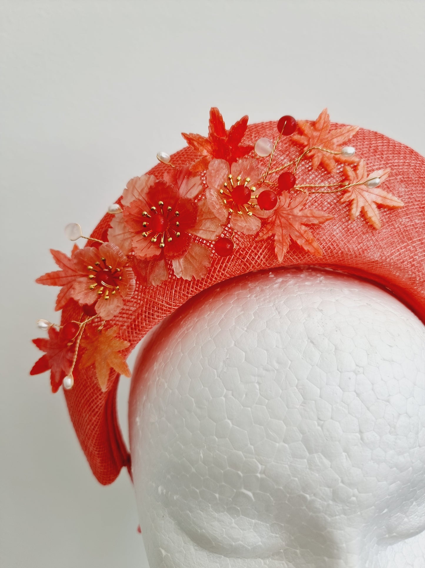 Miss Maple. Womens Coral sinamay halo headband fascinator with floral detail