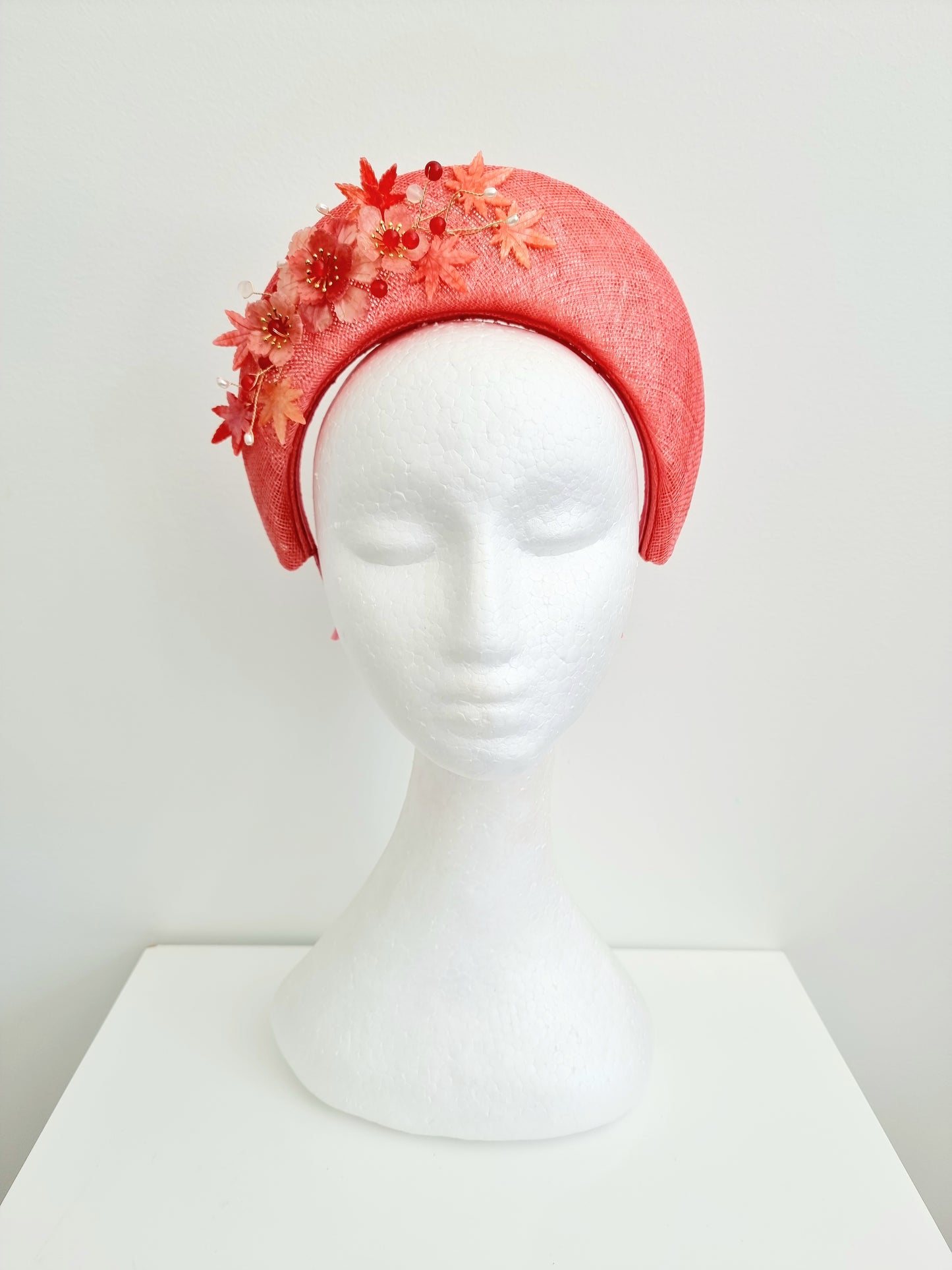 Miss Maple. Womens Coral sinamay halo headband fascinator with floral detail