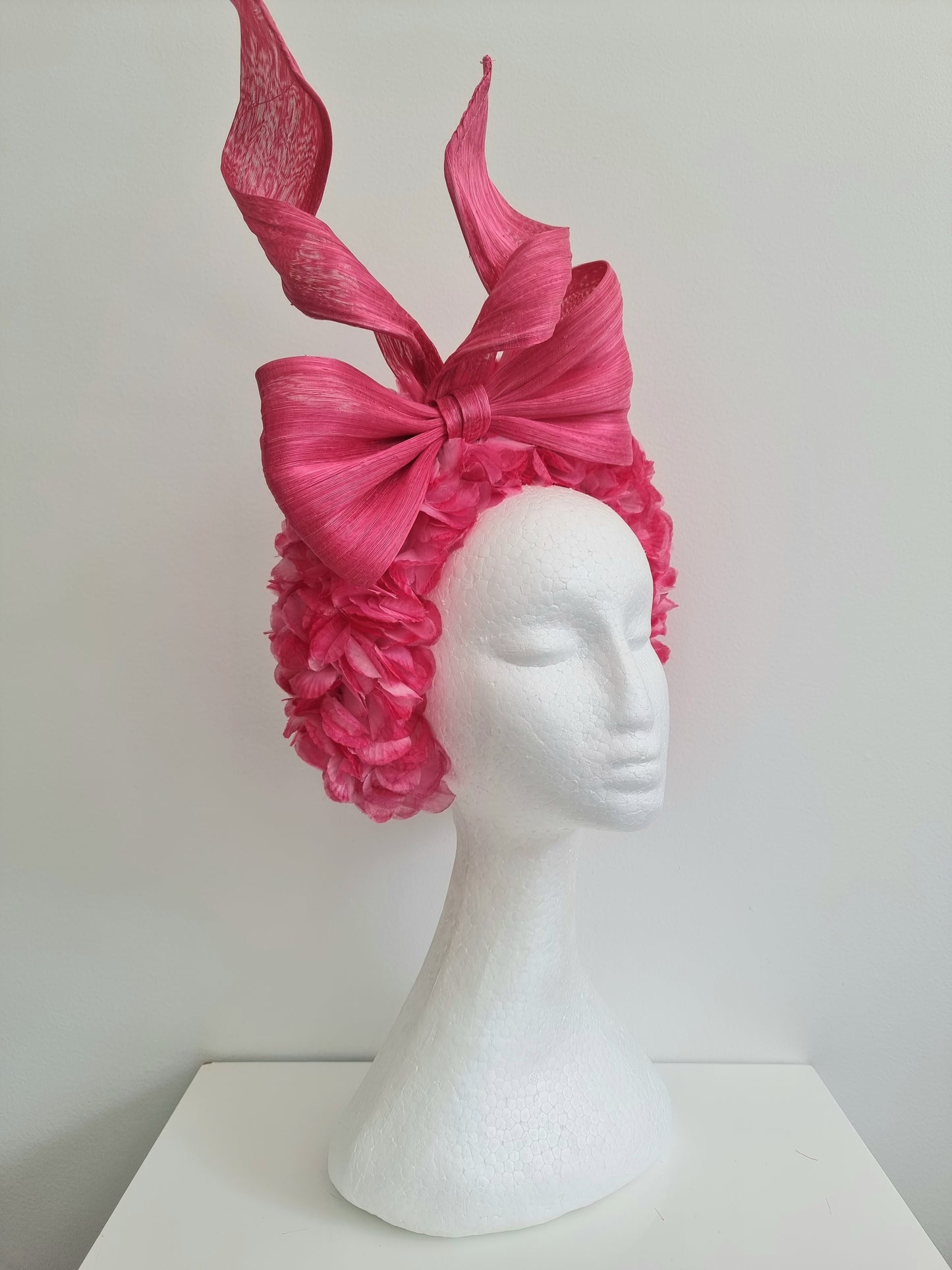 Miss Emily.  Womens Pink tonal ruffle headband with silk bow