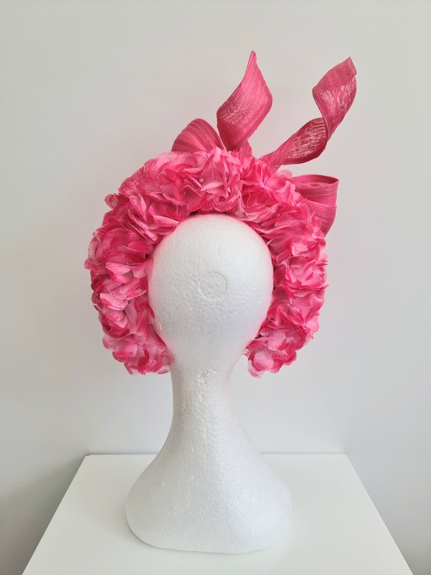 Miss Emily.  Womens Pink tonal ruffle headband with silk bow