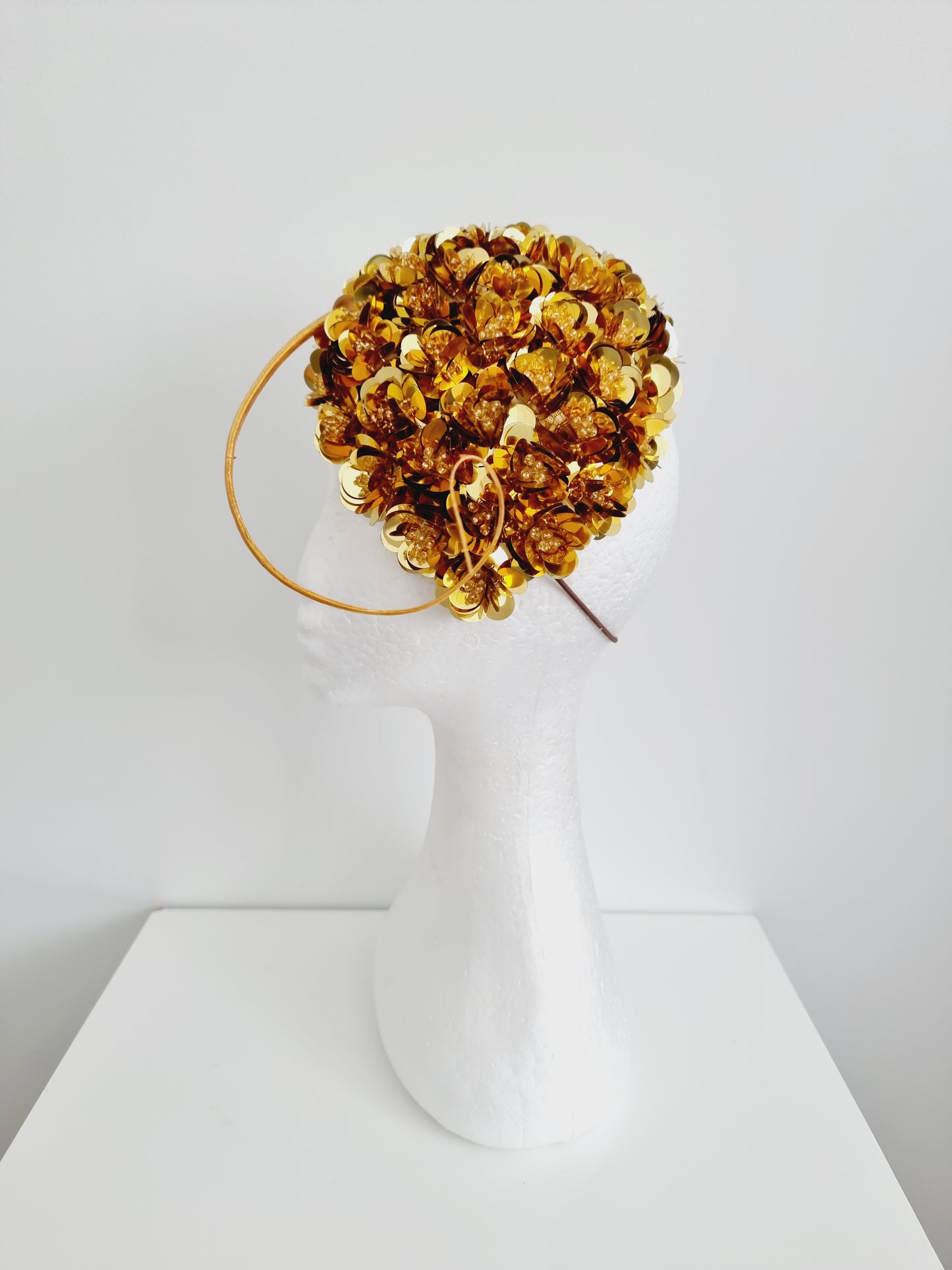 Miss Jamie . Womens Metallic Gold 3D flower encrusted fascinator with quill