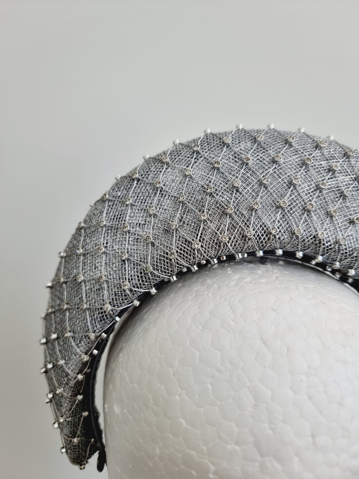 Miss Madeline. Womens Silver sinamay halo headband fascinator with rhinestone mesh overlay