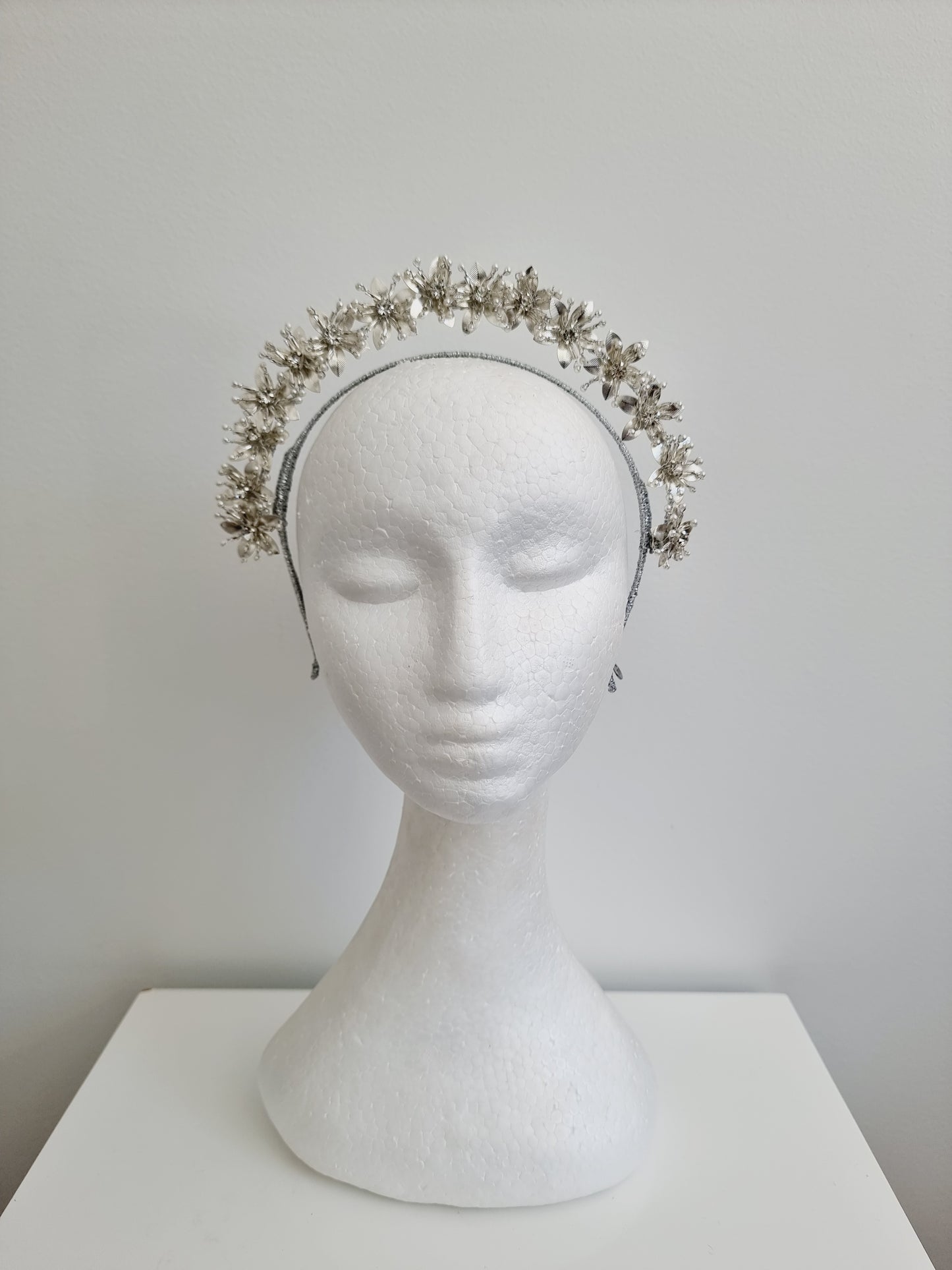 Miss Kiara. Womens flower headband fascinator in Metallic Silver