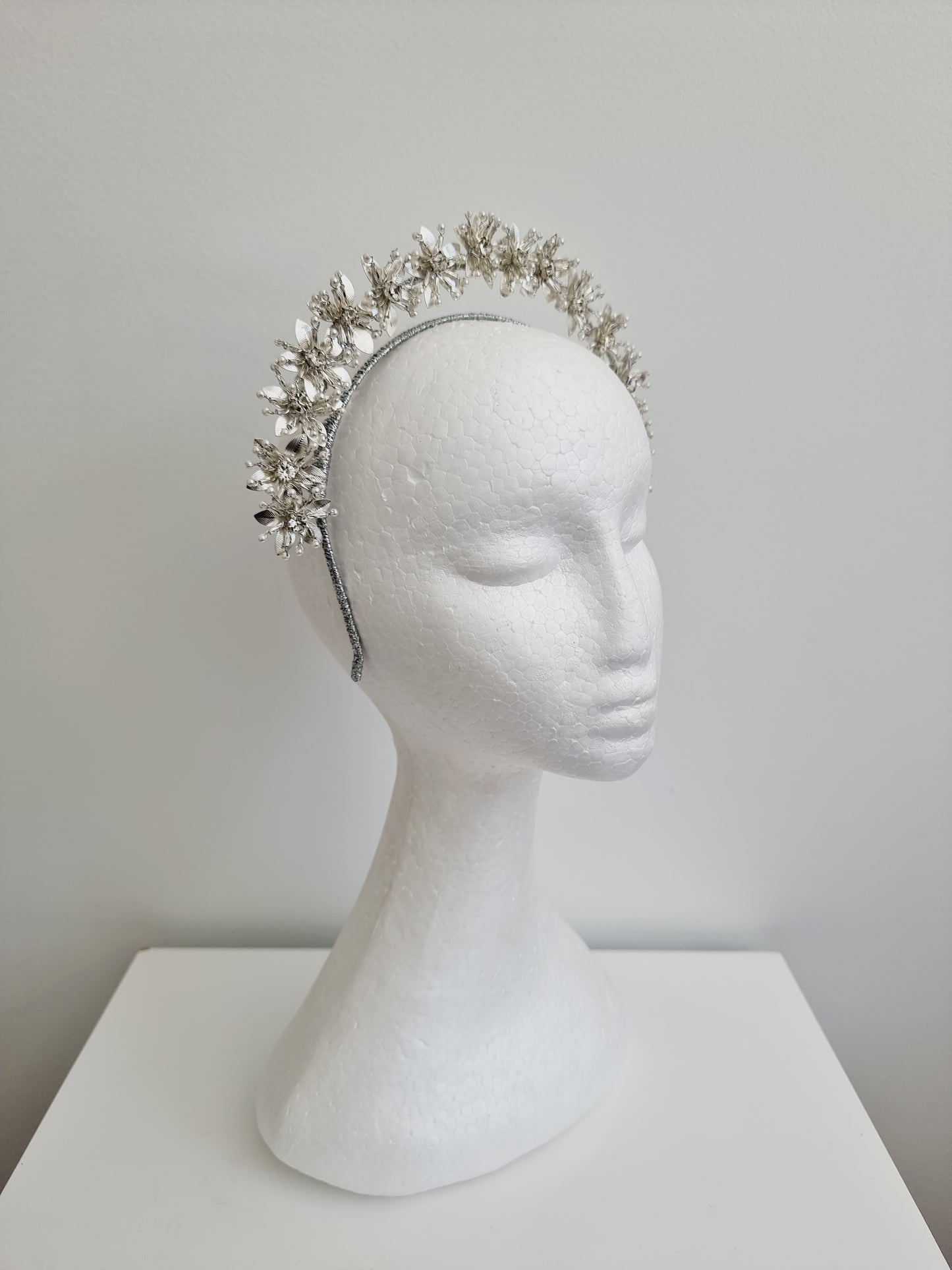 Miss Kiara. Womens flower headband fascinator in Metallic Silver