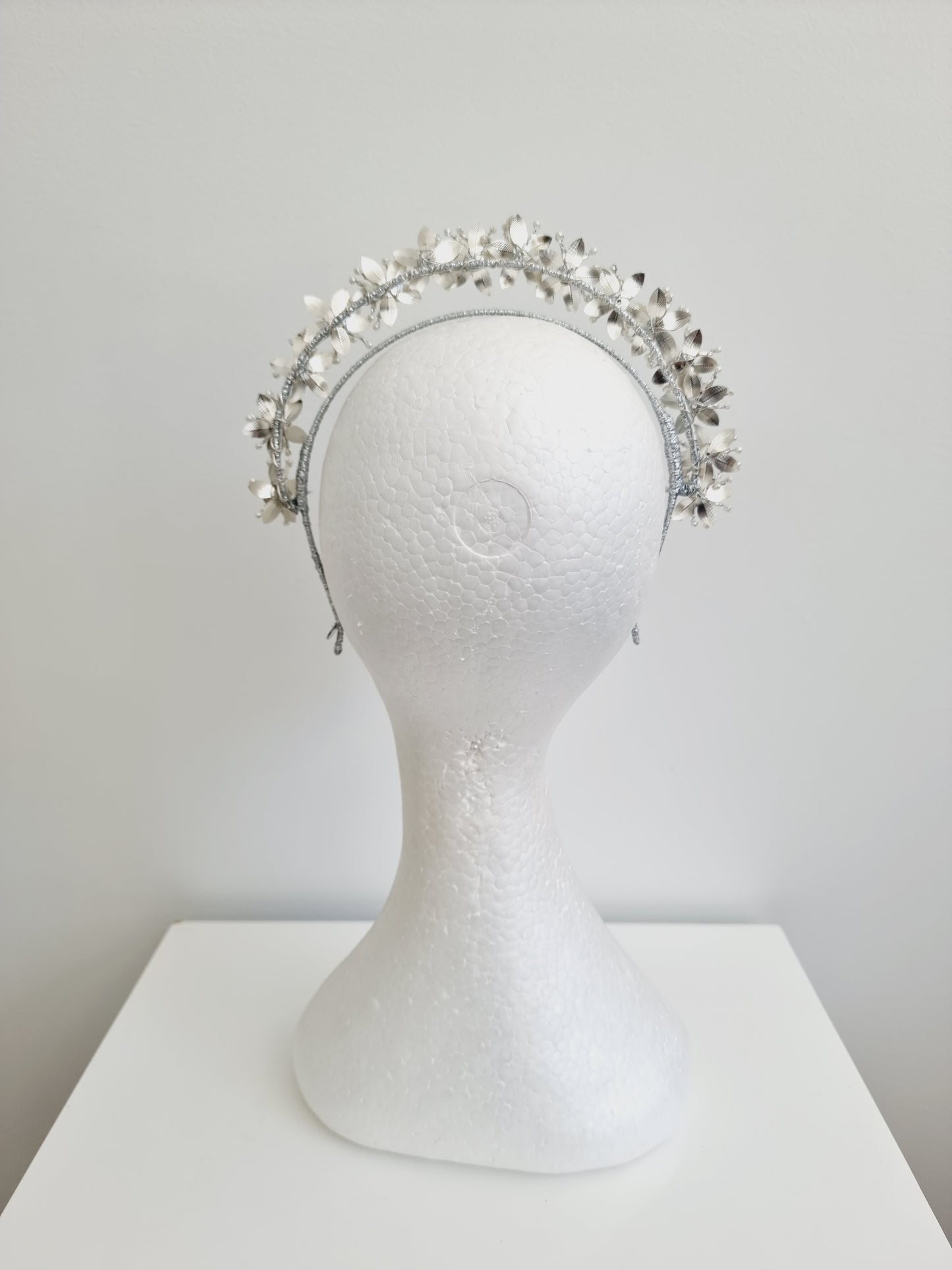 Miss Kiara. Womens flower headband fascinator in Metallic Silver