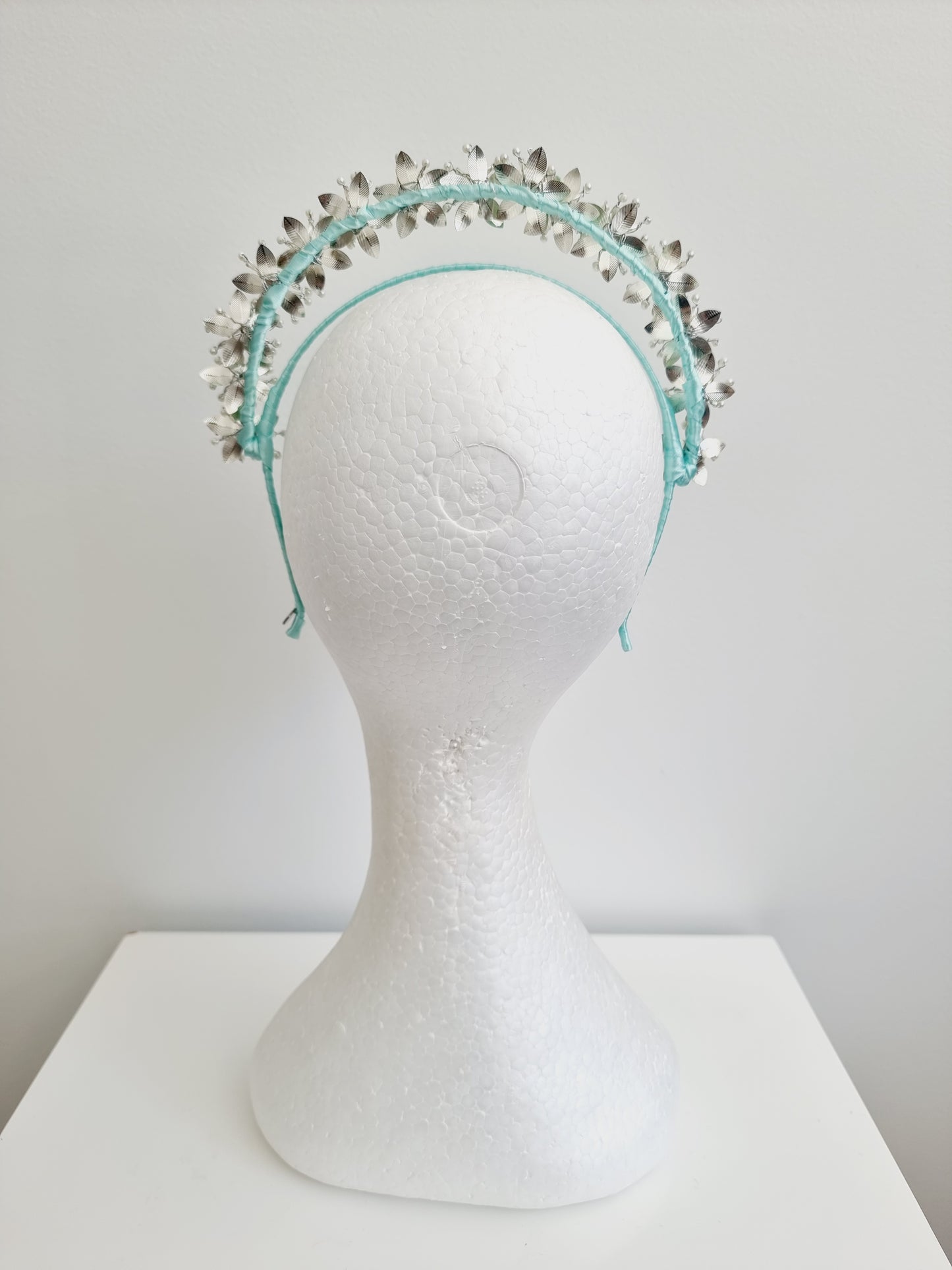 Miss Kiara. Womens flower headband fascinator in Mint Green