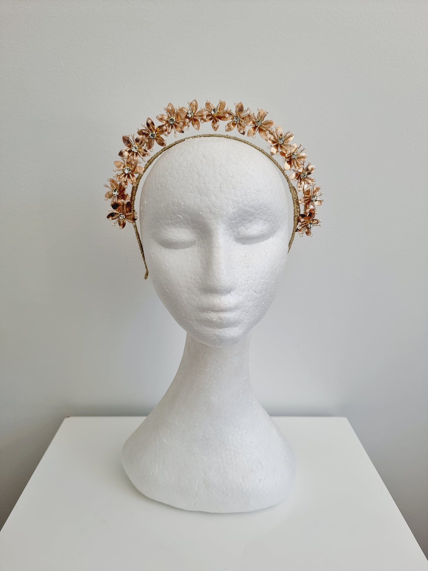 Miss Kiara. Womens flower headband fascinator in gold