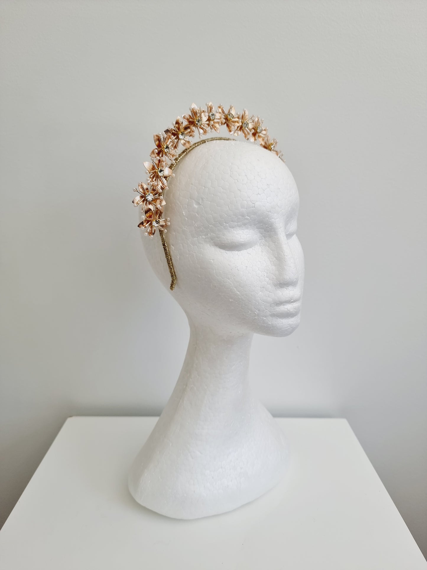 Miss Kiara. Womens flower headband fascinator in gold