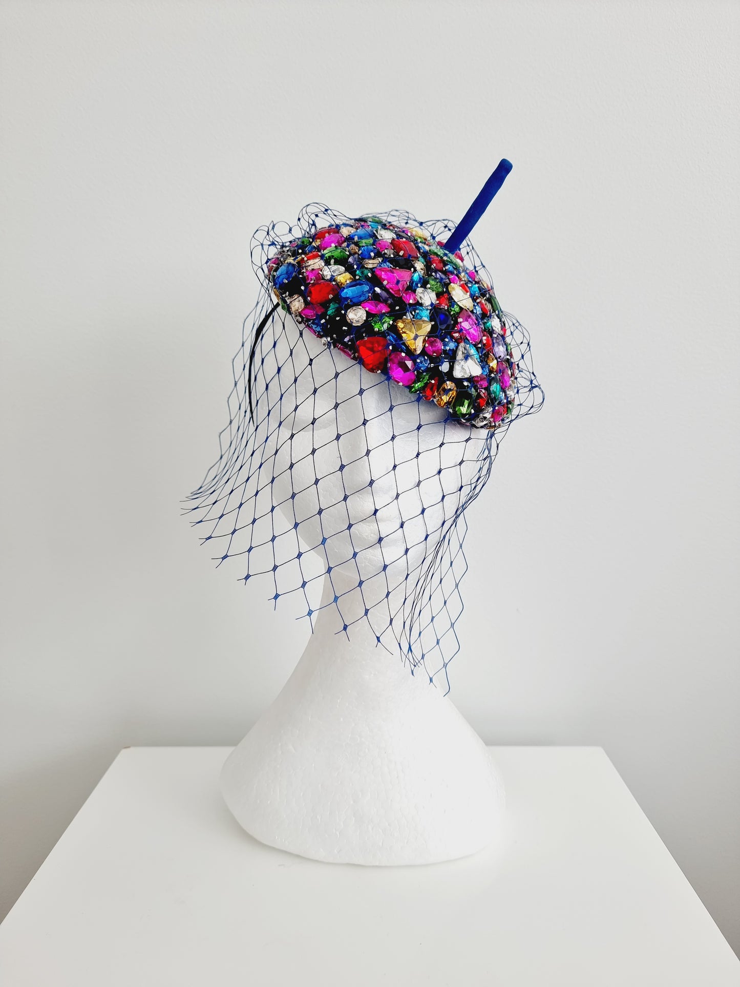 Miss Candy Crush. Womens mutli coloured rhinestone encrusted  button fascinator