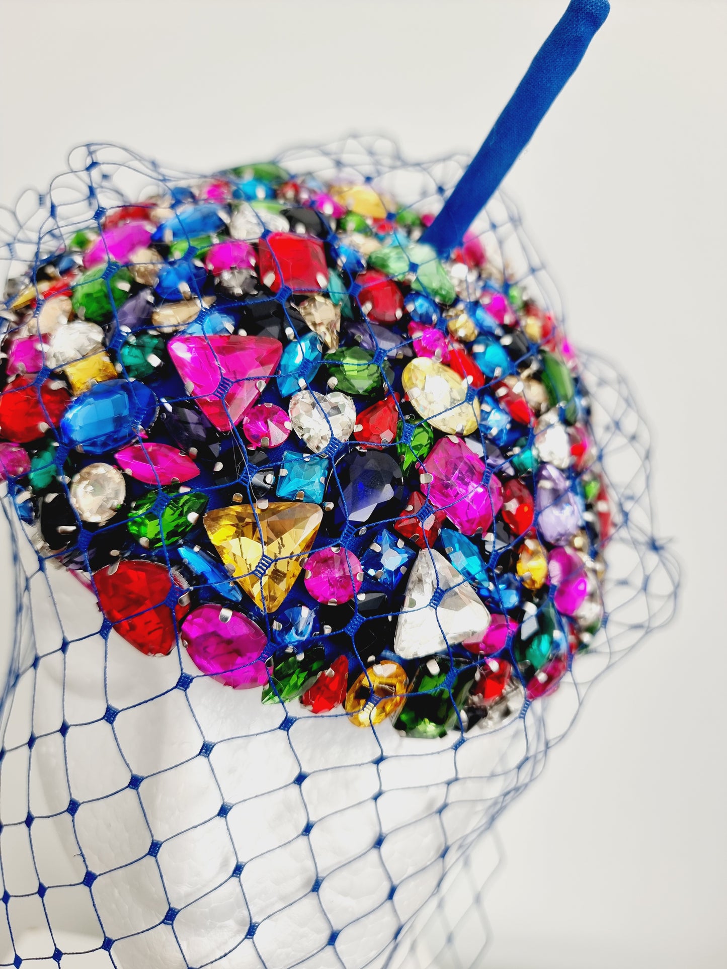 Miss Candy Crush. Womens mutli coloured rhinestone encrusted  button fascinator