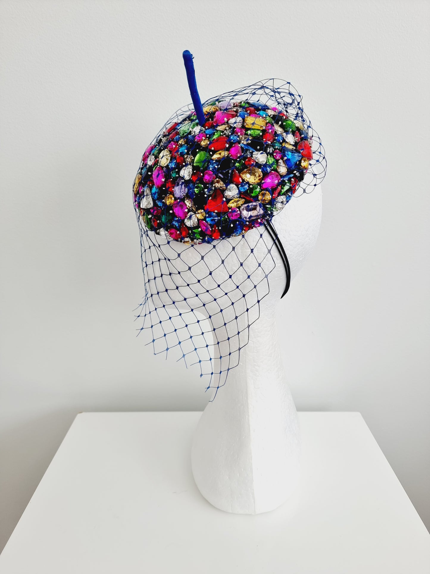 Miss Candy Crush. Womens mutli coloured rhinestone encrusted  button fascinator