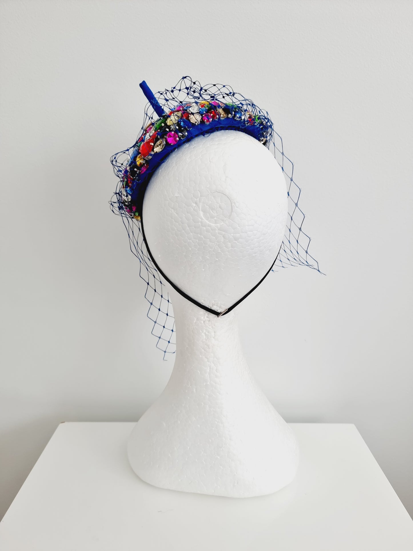 Miss Candy Crush. Womens mutli coloured rhinestone encrusted  button fascinator