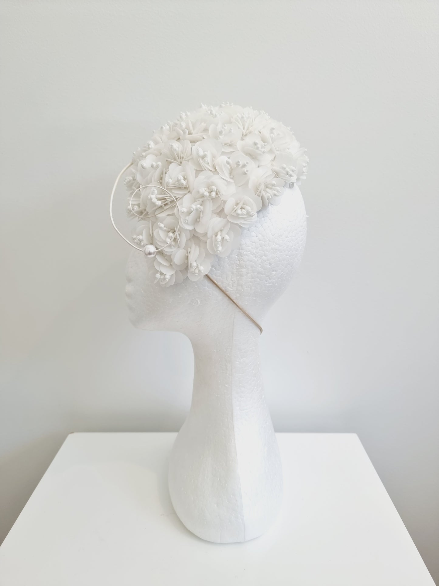 Miss Jamie . Womens White 3D flower encrusted fascinator with quill