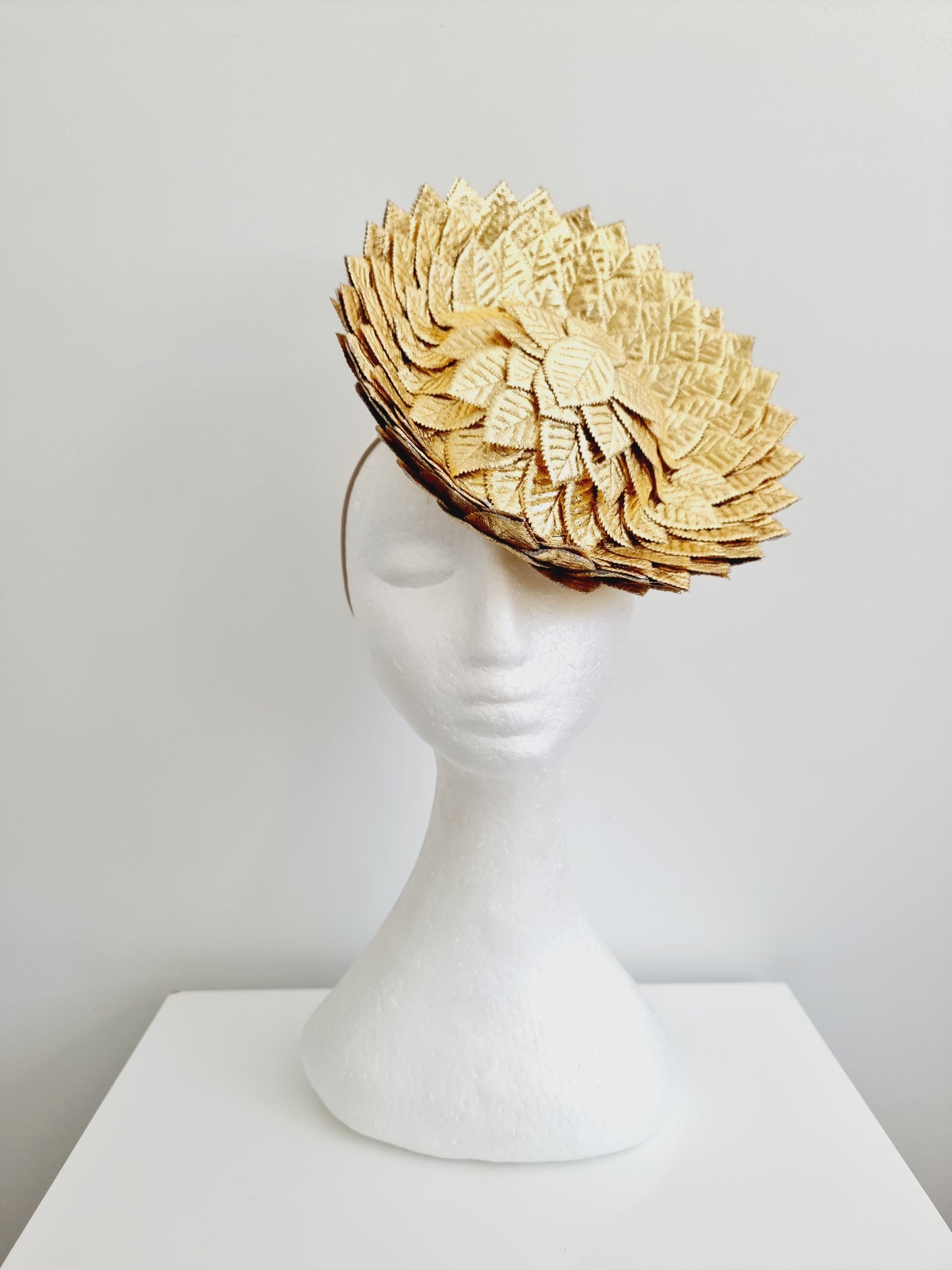 Miss Demi. Womens Gold saucer fascinator