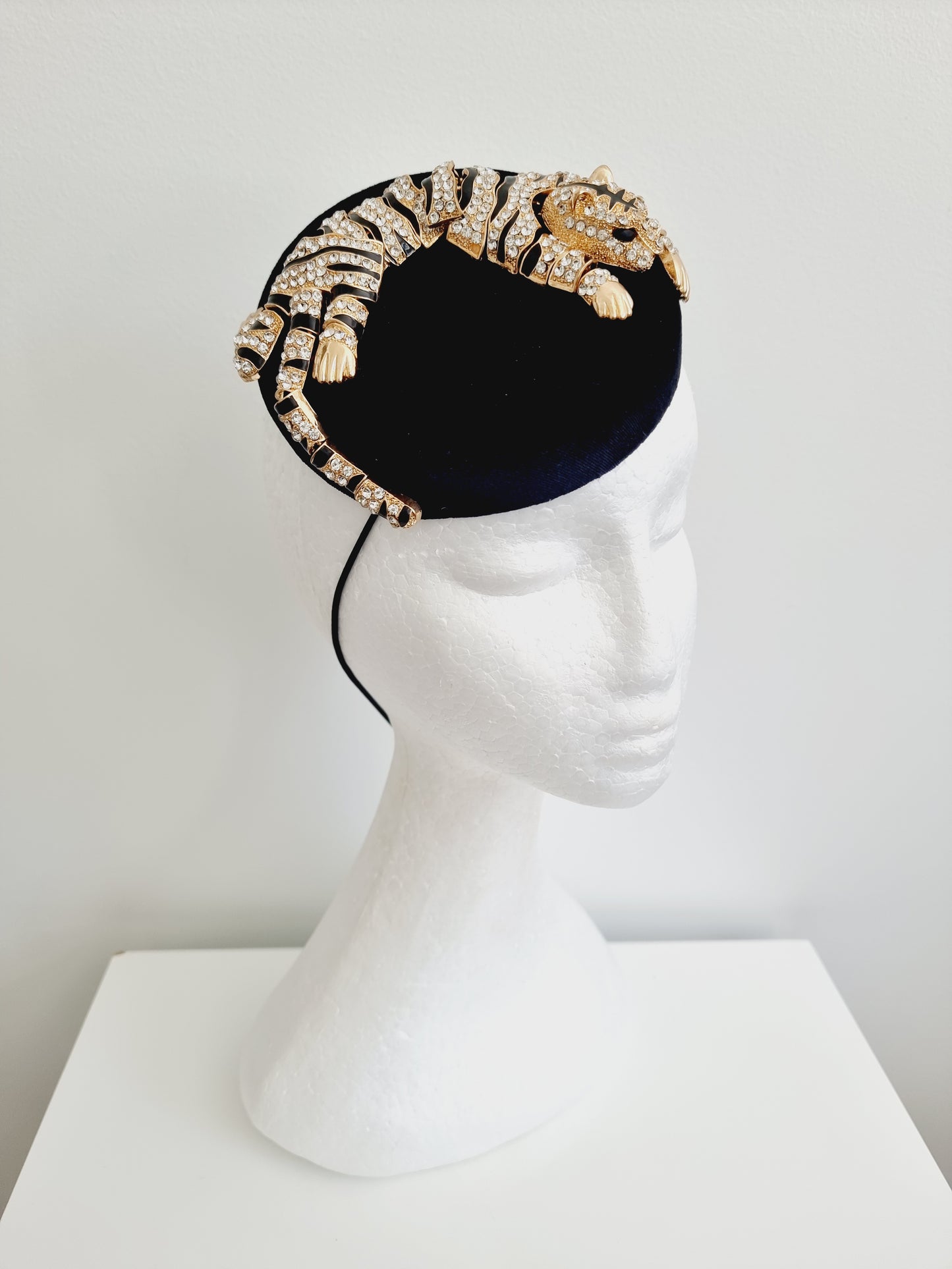 Miss Bengal. Womens black button fascinator with rhinestone tiger and matching bag