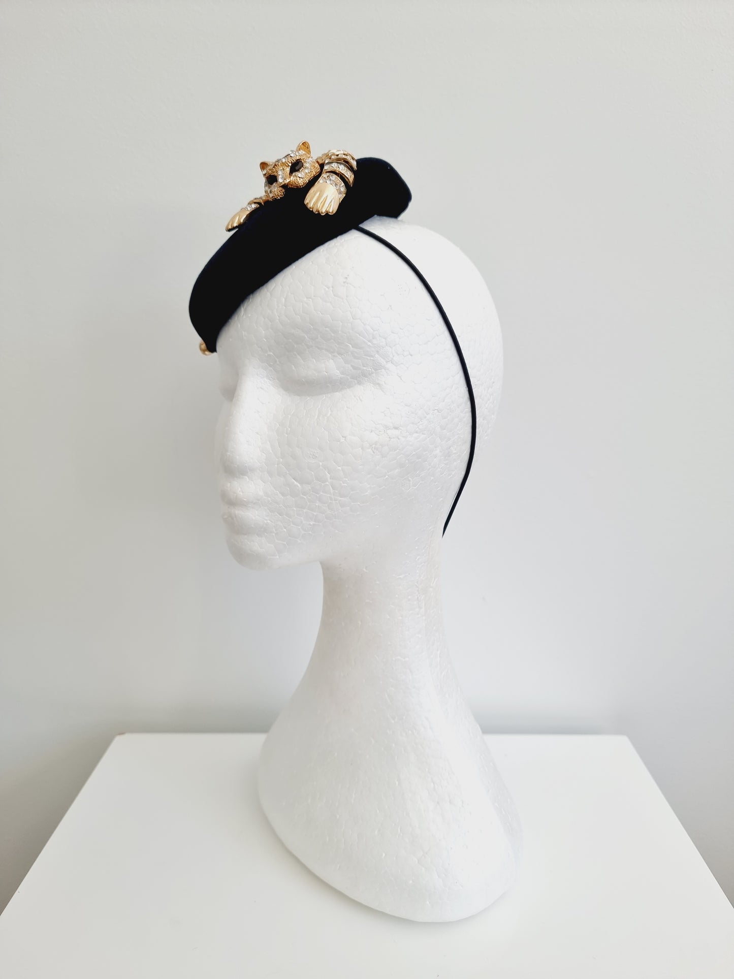 Miss Bengal. Womens black button fascinator with rhinestone tiger and matching bag