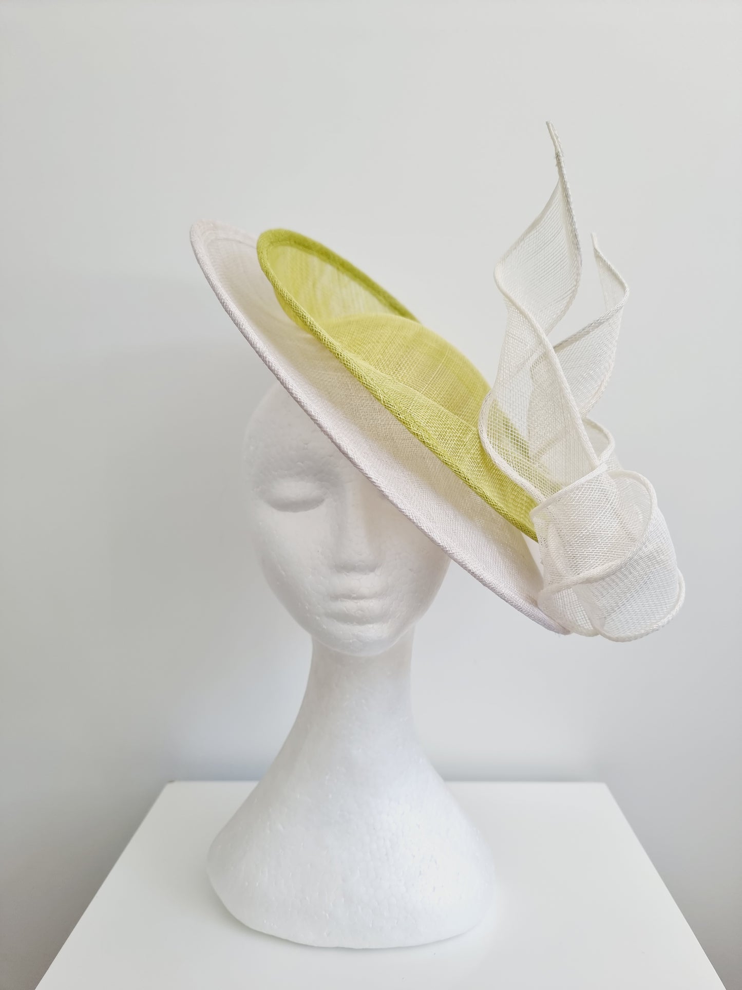 Miss Malarey. Womens Off white and lime green double saucer fascinator