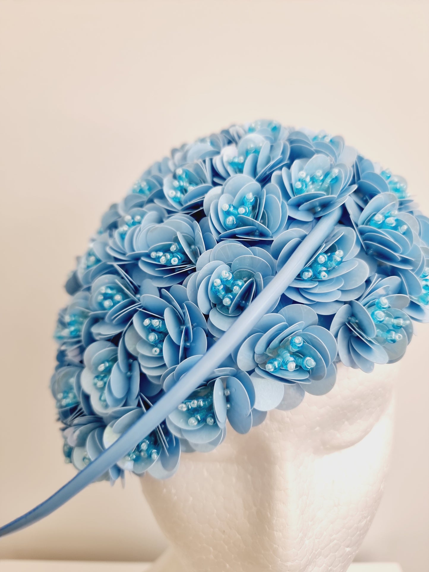 Miss Jamie . Womens Light Blue 3D flower encrusted fascinator with quill