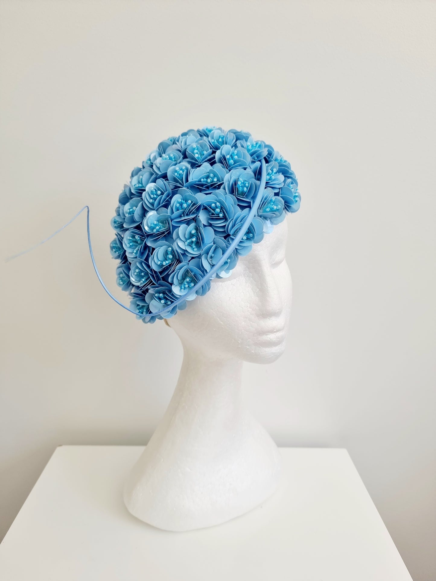 Miss Jamie . Womens Light Blue 3D flower encrusted fascinator with quill