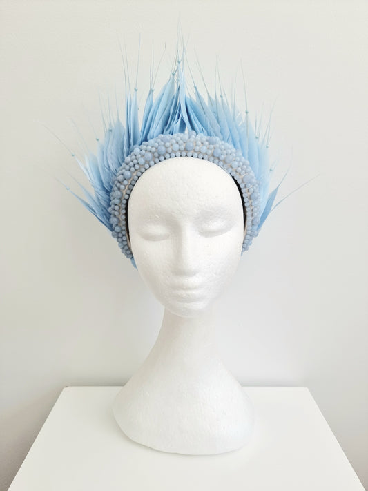 Miss Aldia. Womens Pale Blue pearl and feather headband fasinator