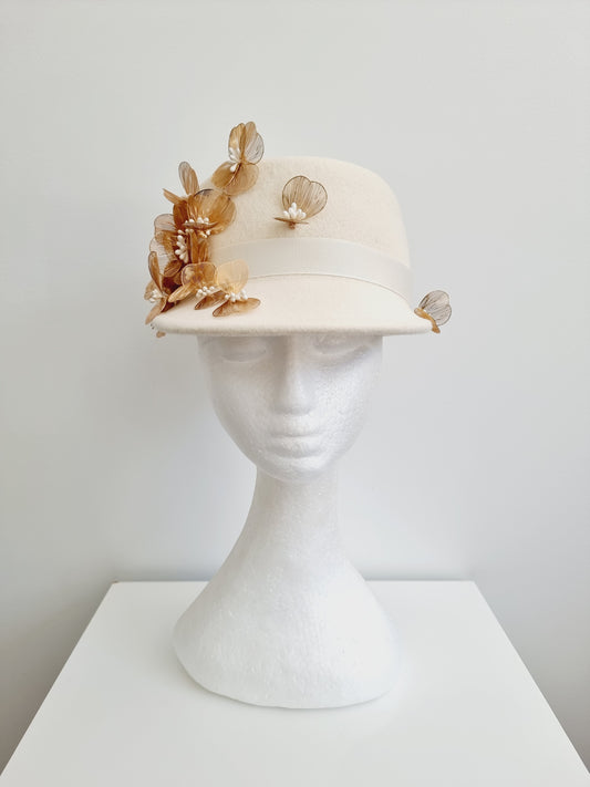 Miss Dominica. Womens Ivory wool felt cap with gold floral  detailing