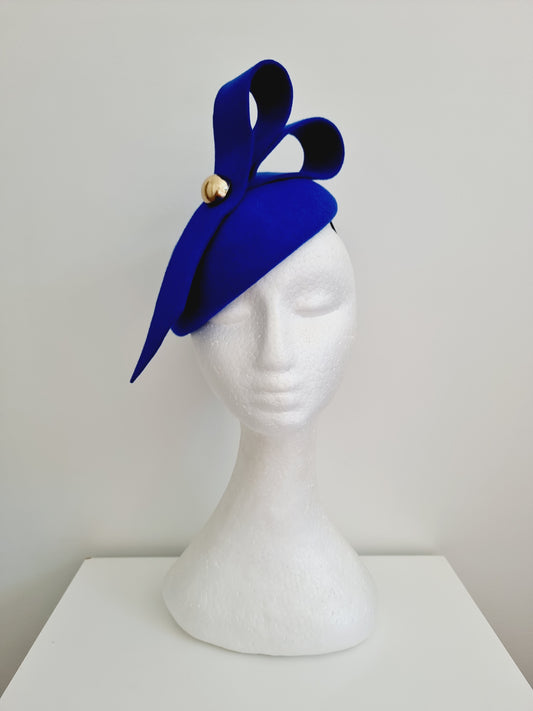 Miss Baker. Womens Royal Blue felt button fascinator with loops