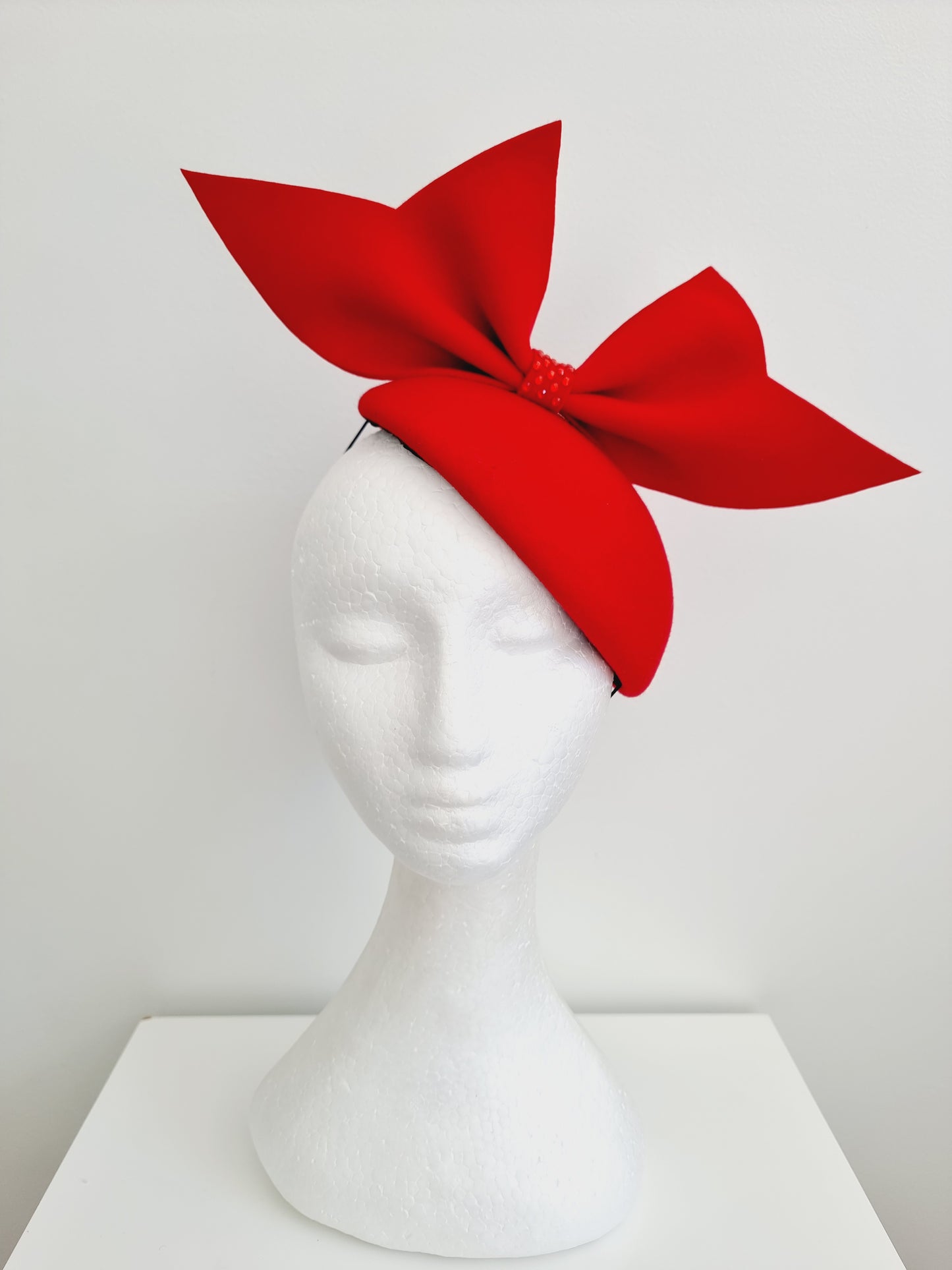 Miss Burla. Womens Red felt button fascinator with bow